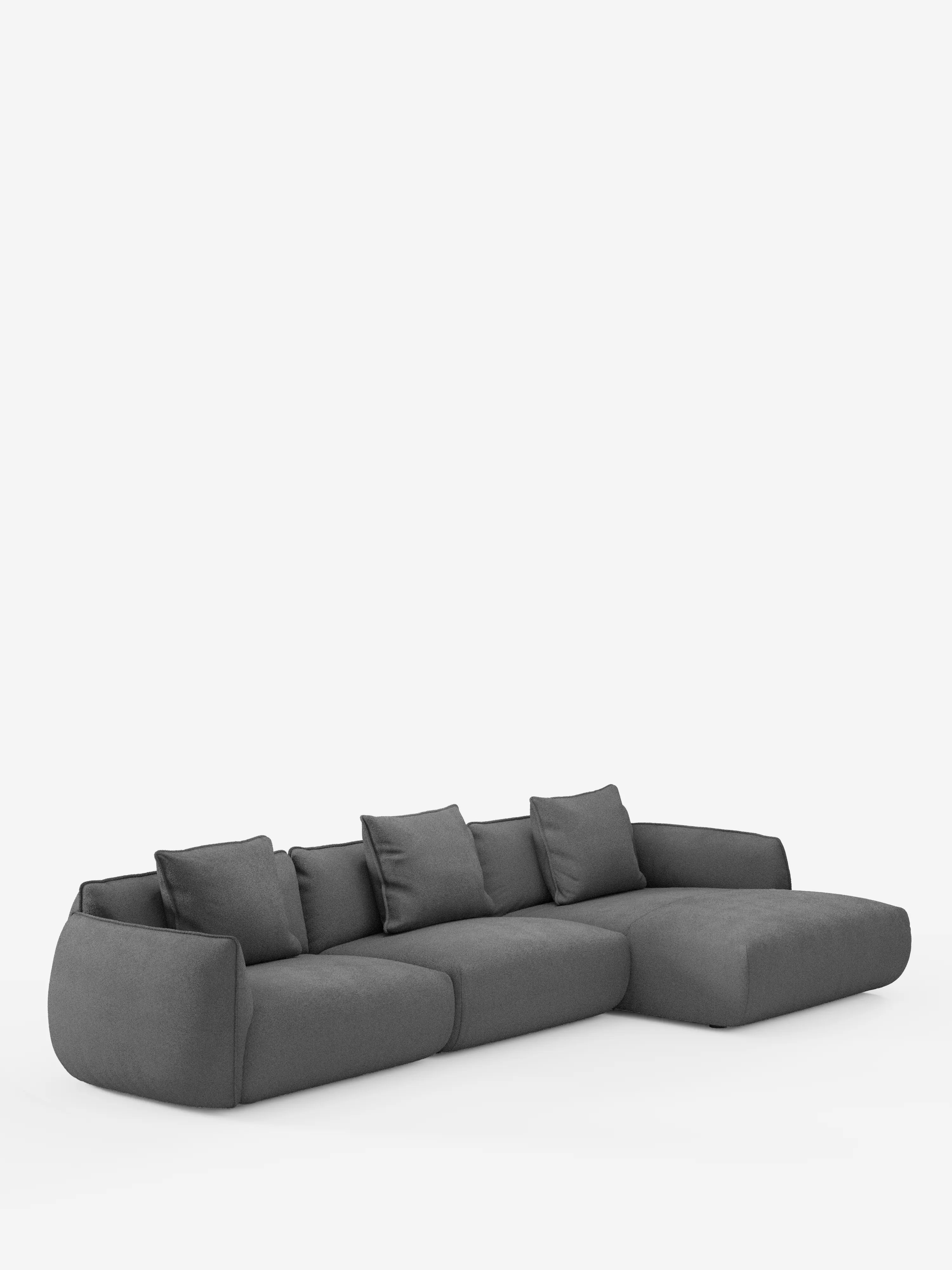 Il divano angolare con penisola componibile Nimbus in morbido tessuto effetto cotone smacchiabile T33 di Divani.Store, qui raffigurato in grigio scuro, presenta bordi morbidi e arrotondati e schienali bassi. Questo moderno divano componibile offre tre cuscini di seduta, quattro cuscini dello schienale abbinati e una chaise longue sul lato destro, il tutto presentato su uno sfondo bianco a tinta unita.