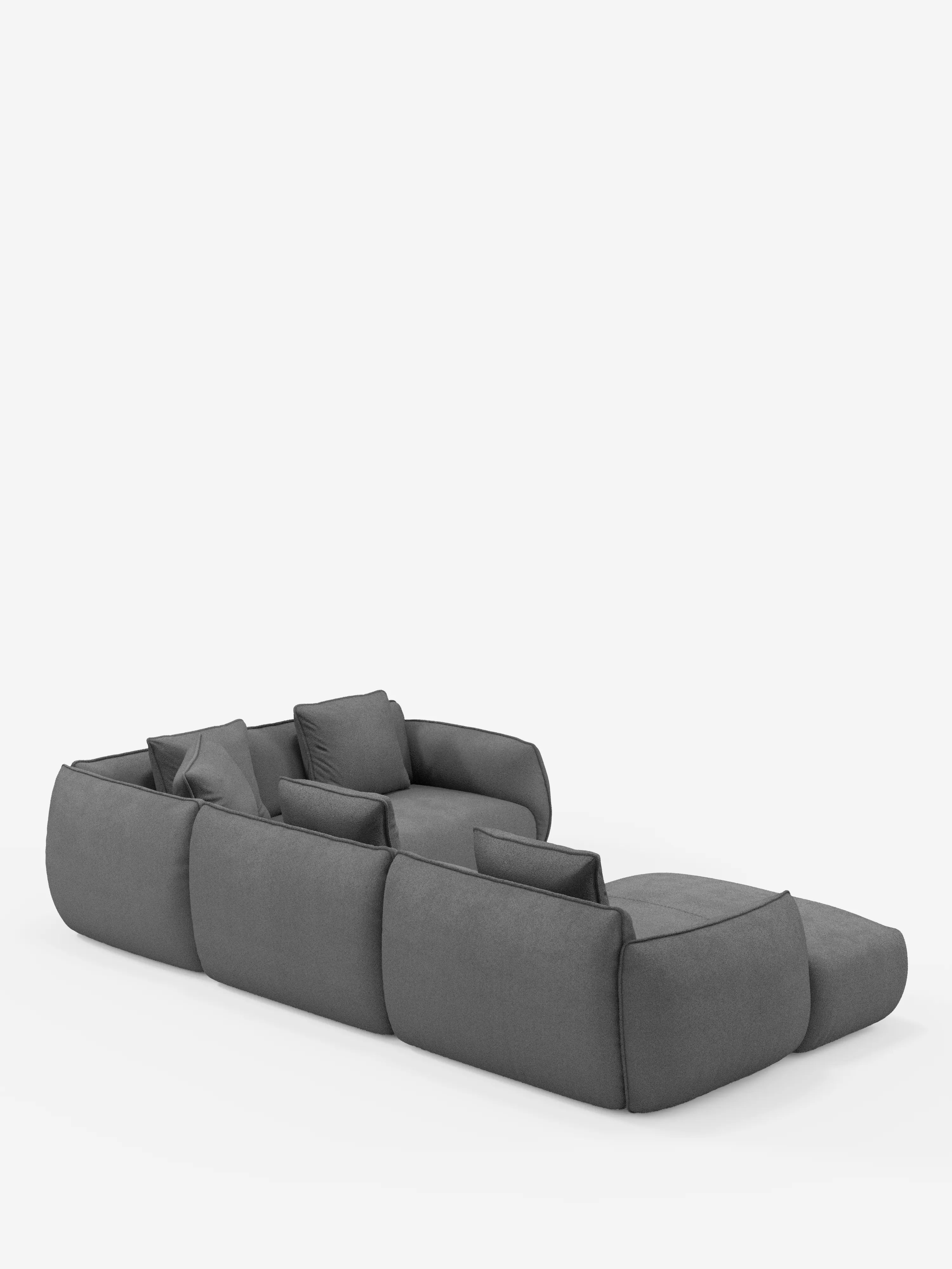 Un divano angolare panoramico componibile Nimbus a tre elementi, dal design contemporaneo e dal profilo ribassato, con penisola e angolo in tessuto antimacchia T33 di Divani.Store, rivestito in tessuto grigio scuro antimacchia con morbidi cuscini e braccioli. I moduli sono disposti su uno sfondo bianco a forma di L, con una sezione che si estende in avanti per formare una chaise longue.