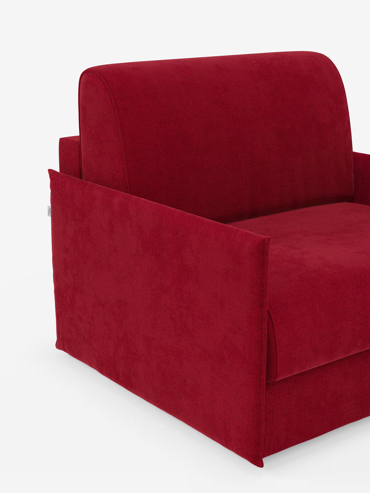 La poltrona letto compatta Evans con materasso di Divani.Store è una poltrona elegante e moderna, rivestita in tessuto T23 rosso intenso e resistente alle macchie. Presentata su uno sfondo bianco a tinta unita, con solo il lato sinistro e la seduta visibili, le sue linee pulite, gli ampi braccioli e lo schienale imbottito e spesso offrono eleganza e praticità. Questa poltrona letto sfoderabile salvaspazio è la soluzione perfetta per qualsiasi stanza che necessiti di un letto aggiuntivo funzionale ma allo