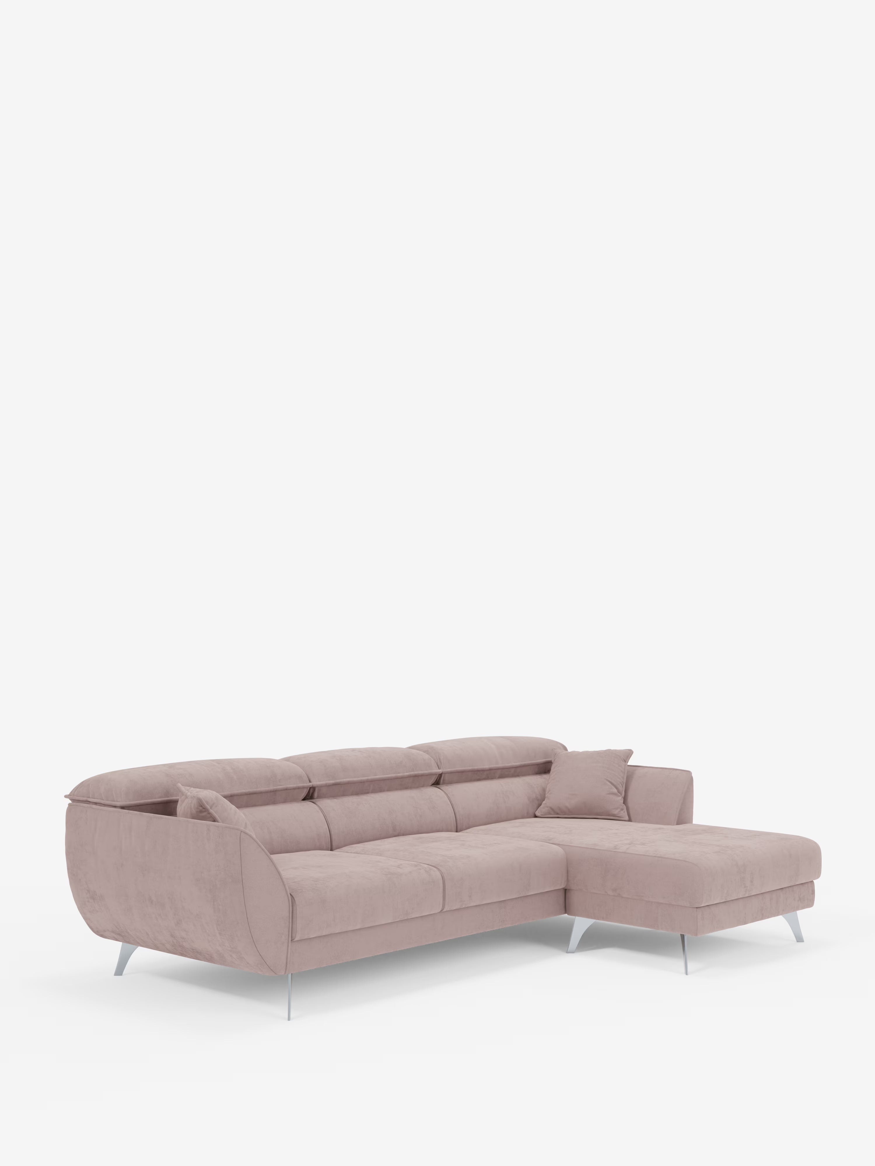 Vi presentiamo il divano angolare con penisola e sedute estensibili Michelangelo di Divani.Store: un moderno divano componibile rosa chiaro con chaise longue a destra, cuscini di seduta e schienale trapuntati, gambe in metallo argentato e un cuscino coordinato. Realizzato in elegante tessuto T30 effetto velluto resistente alle macchie e dotato di poggiatesta regolabili, questo divano risalta magnificamente su uno sfondo bianco a tinta unita.