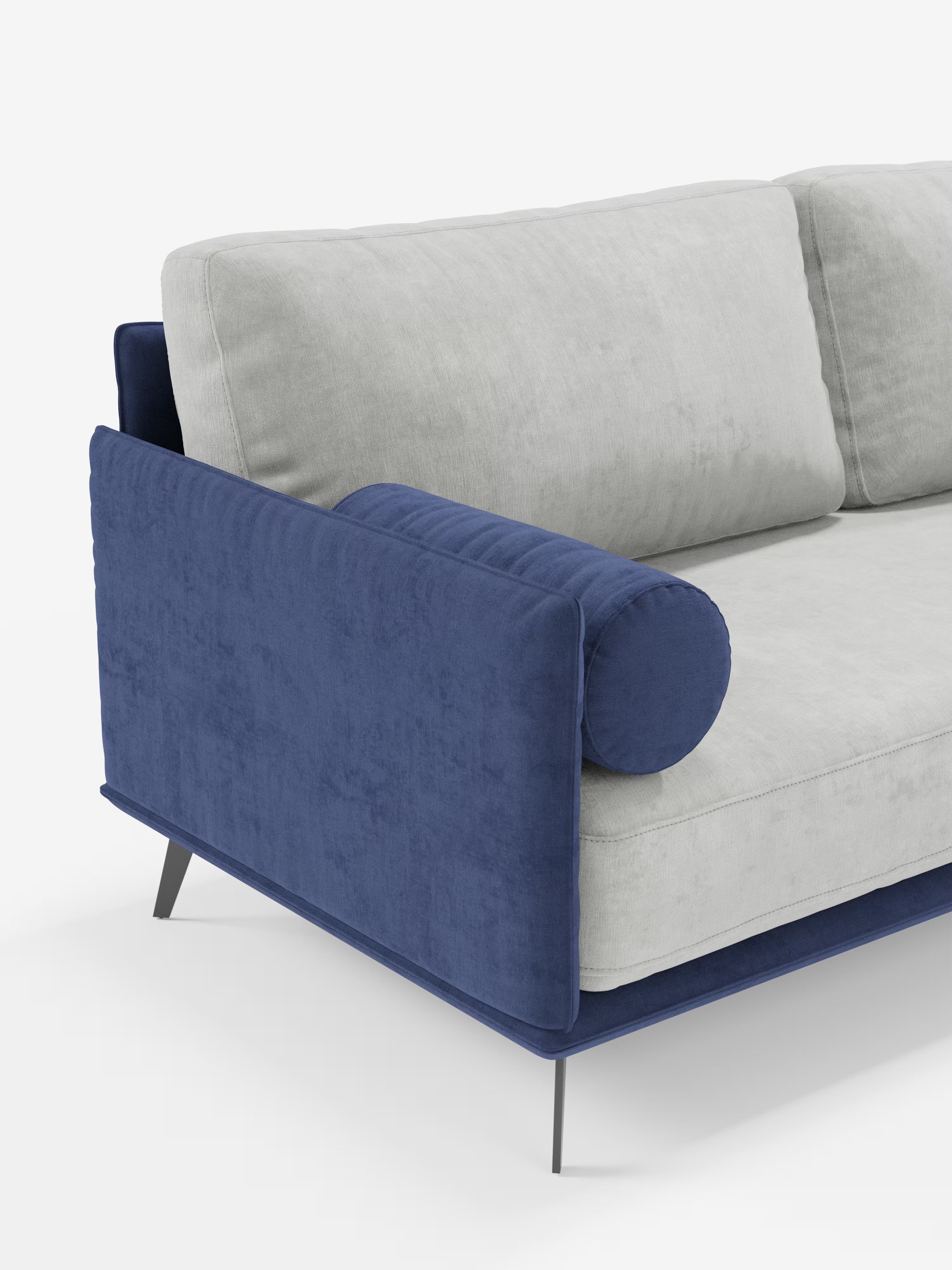 Il divano Basalto a 2 o 3 posti bicolore di Divani.Store presenta un design elegante e minimalista, caratterizzato da un'esclusiva seduta singola rivestita in morbido tessuto T31 grigio chiaro resistente alle macchie, fianchi in velluto blu intenso, un cuscino cilindrico abbinato e sottili gambe angolate in metallo nero. Gli schienali in piuma d'oca aggiungono un tocco di comfort lussuoso, il tutto splendidamente valorizzato da uno sfondo bianco a tinta unita.