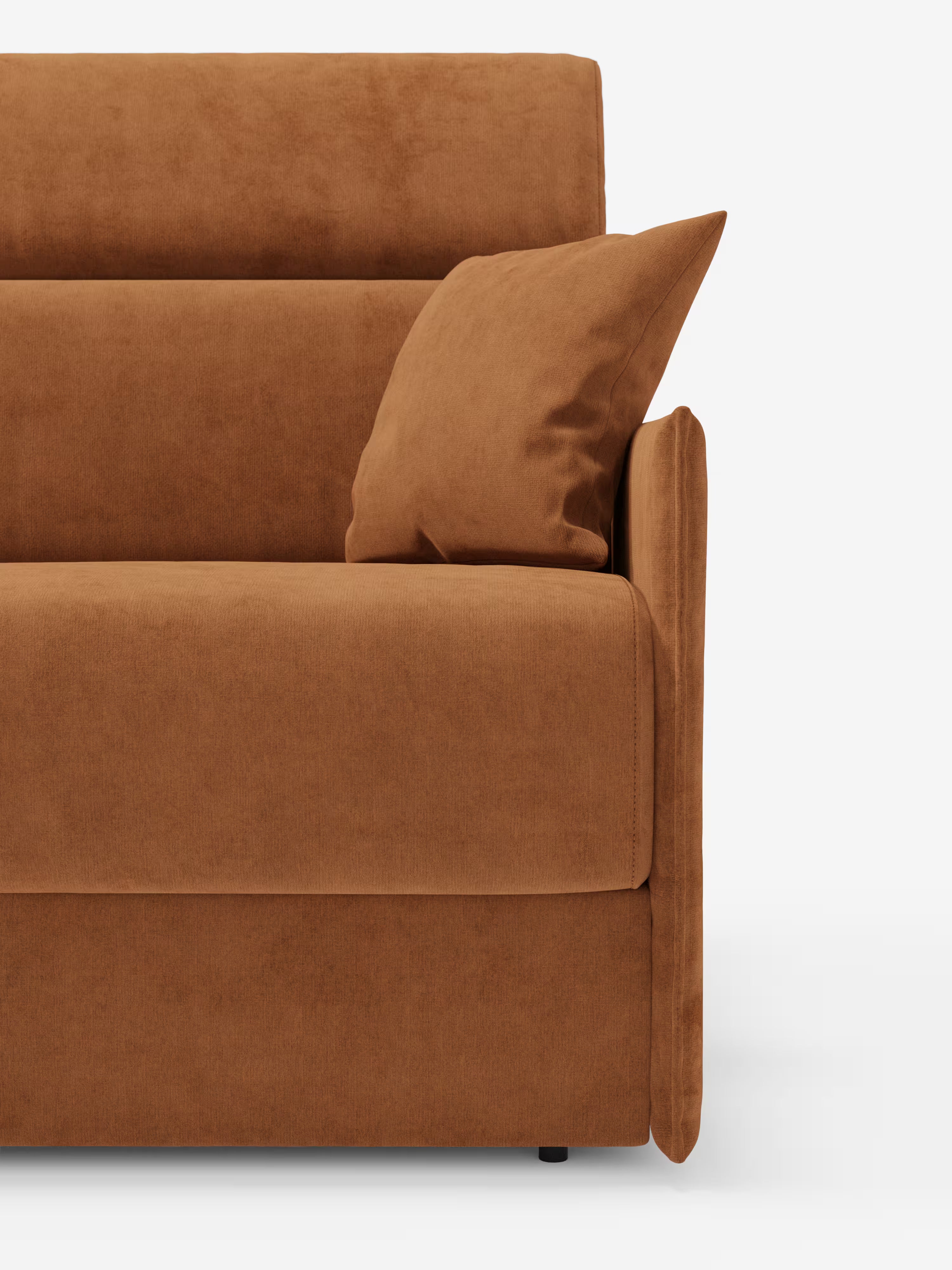Primo piano del lato destro del divano letto Miryam con poggiatesta reclinabili e comfort maxi di Divani.Store, un divano moderno color ruggine rivestito in morbido e soffice tessuto T31 resistente alle macchie. L'immagine mette in risalto il bracciolo, la seduta, lo schienale e un cuscino coordinato. Progettato in stile minimal contemporaneo, questo divano letto compatto risalta sullo sfondo bianco, accentuandone le linee pulite e la texture accogliente.