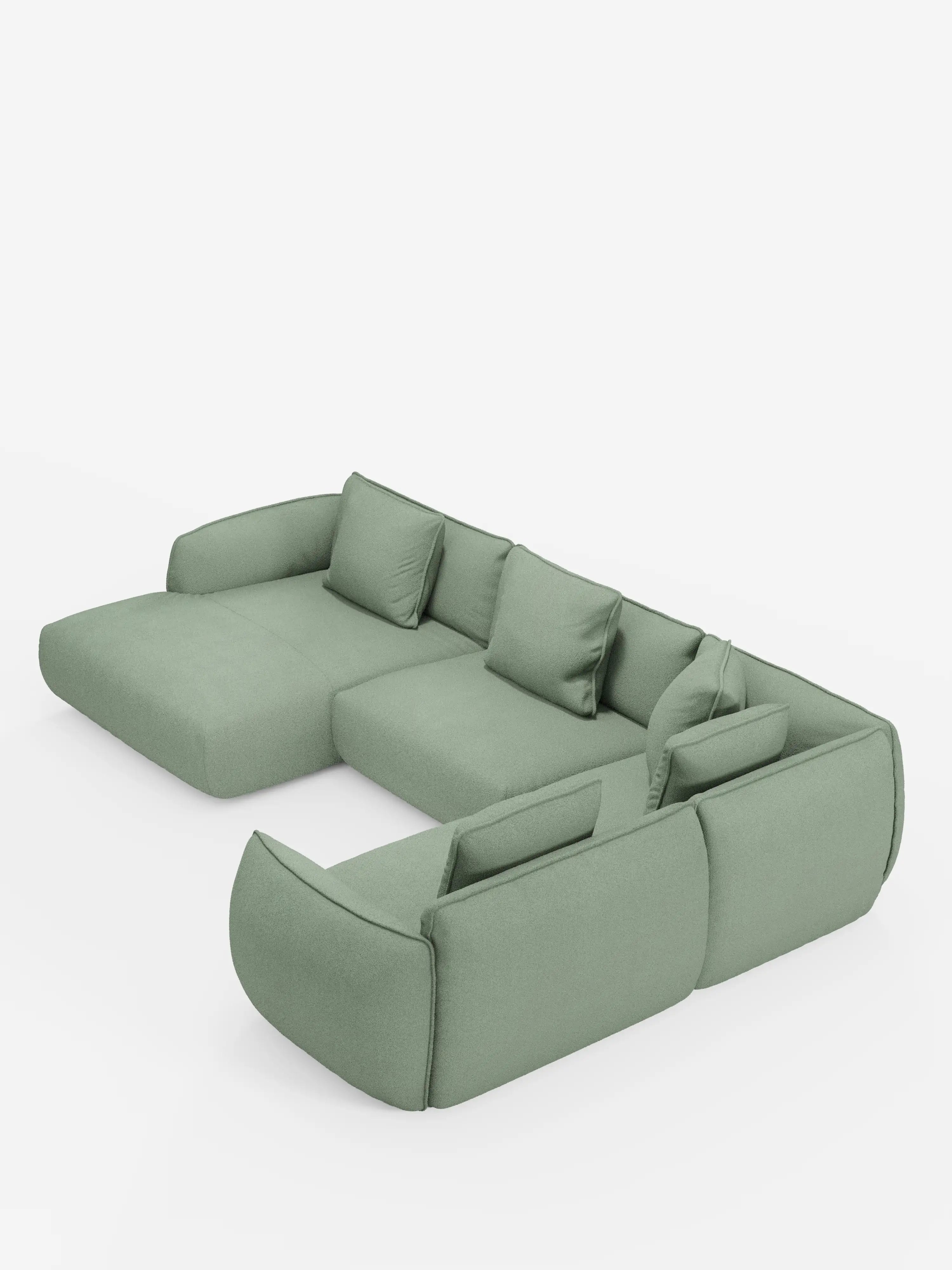 Il divano angolare panoramico componibile Nimbus con penisola e angolo in tessuto smacchiabile t33 di Divani.Store è un divano modulare spazioso e contemporaneo, realizzato in tessuto verde tenue e presentato su uno sfondo bianco. Si caratterizza per le linee pulite, i morbidi cuscini, i braccioli bassi e una chaise longue sul lato sinistro, accompagnata da cinque cuscini decorativi coordinati.