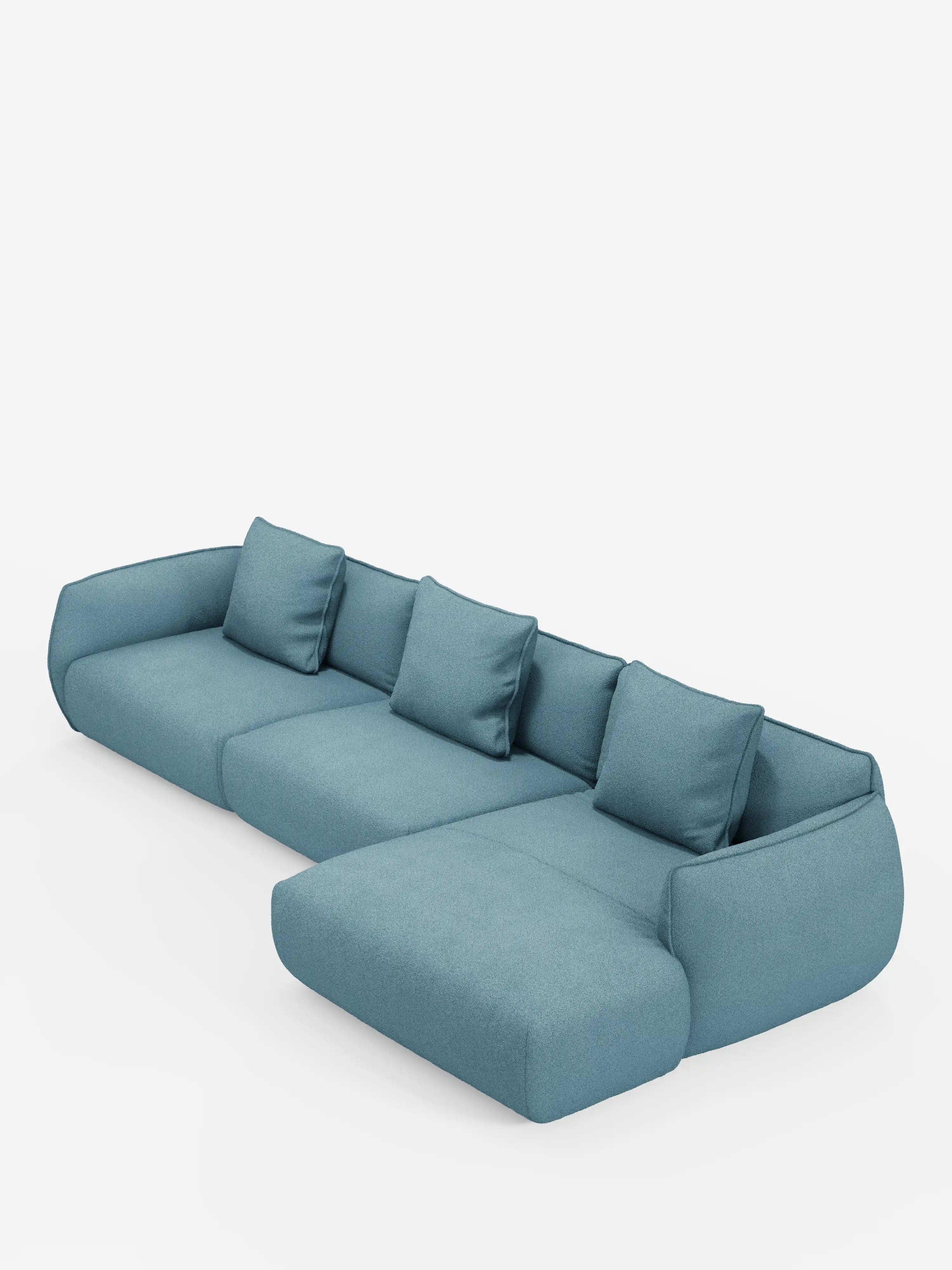 Vi presentiamo il divano angolare con penisola componibile Nimbus in morbido tessuto effetto cotone lavabile T33 di Divani.Store: un moderno divano componibile azzurro con bordi arrotondati, quattro cuscini di seduta e quattro cuscini schienale coordinati. La chaise longue è posizionata sul lato sinistro e il suo design minimalista e contemporaneo risalta magnificamente sullo sfondo bianco.