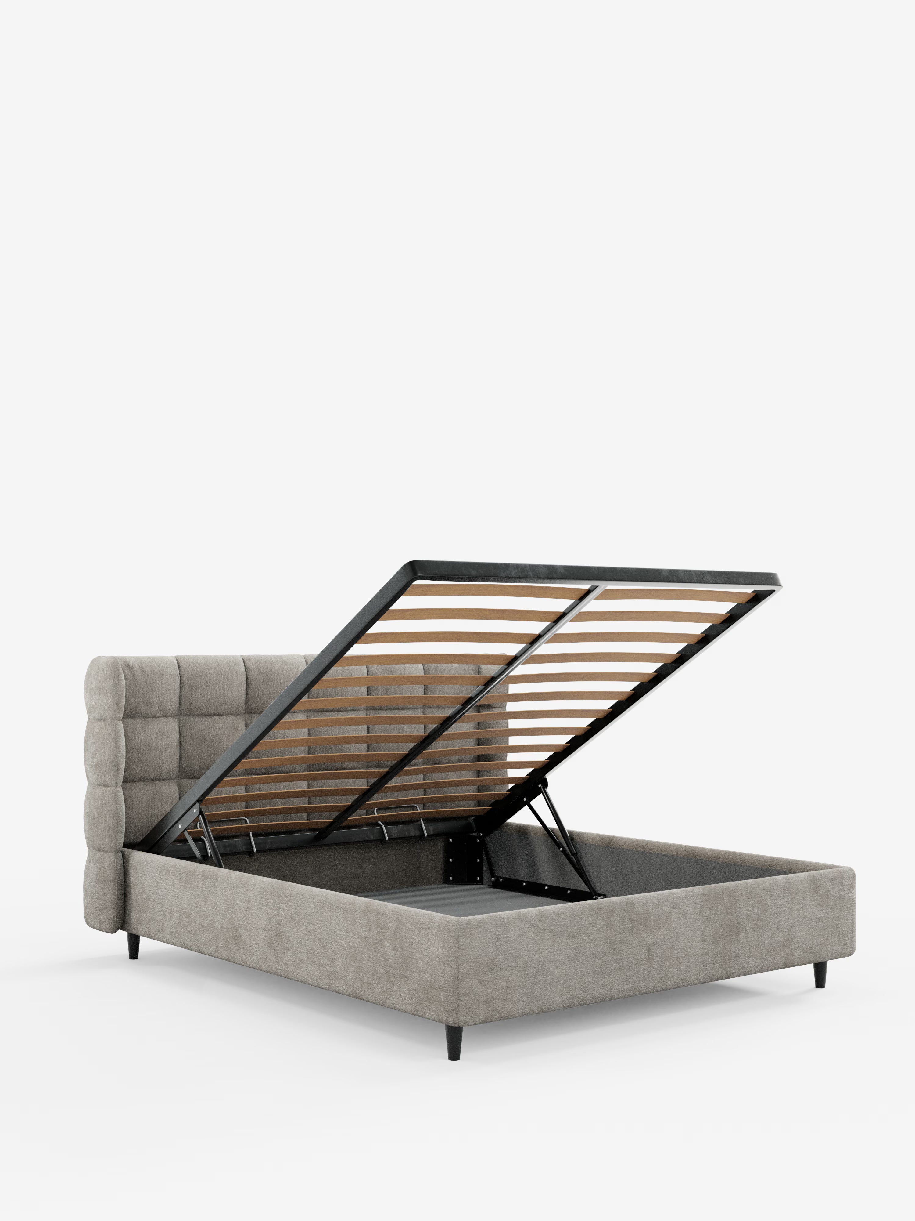 Il letto imbottito RAGNAR con contenitore e testiera capitonné avvolgente di Letti.store dona un tocco di eleganza a qualsiasi camera da letto grazie al suo design moderno in tessuto grigio chiaro certificato Oeko-Tex®. L’ampio vano contenitore sotto il letto è facilmente accessibile grazie alle cerniere idrauliche a sollevamento, mentre le robuste doghe in legno e le eleganti gambe affusolate nere uniscono stile e funzionalità per un risultato raffinato.