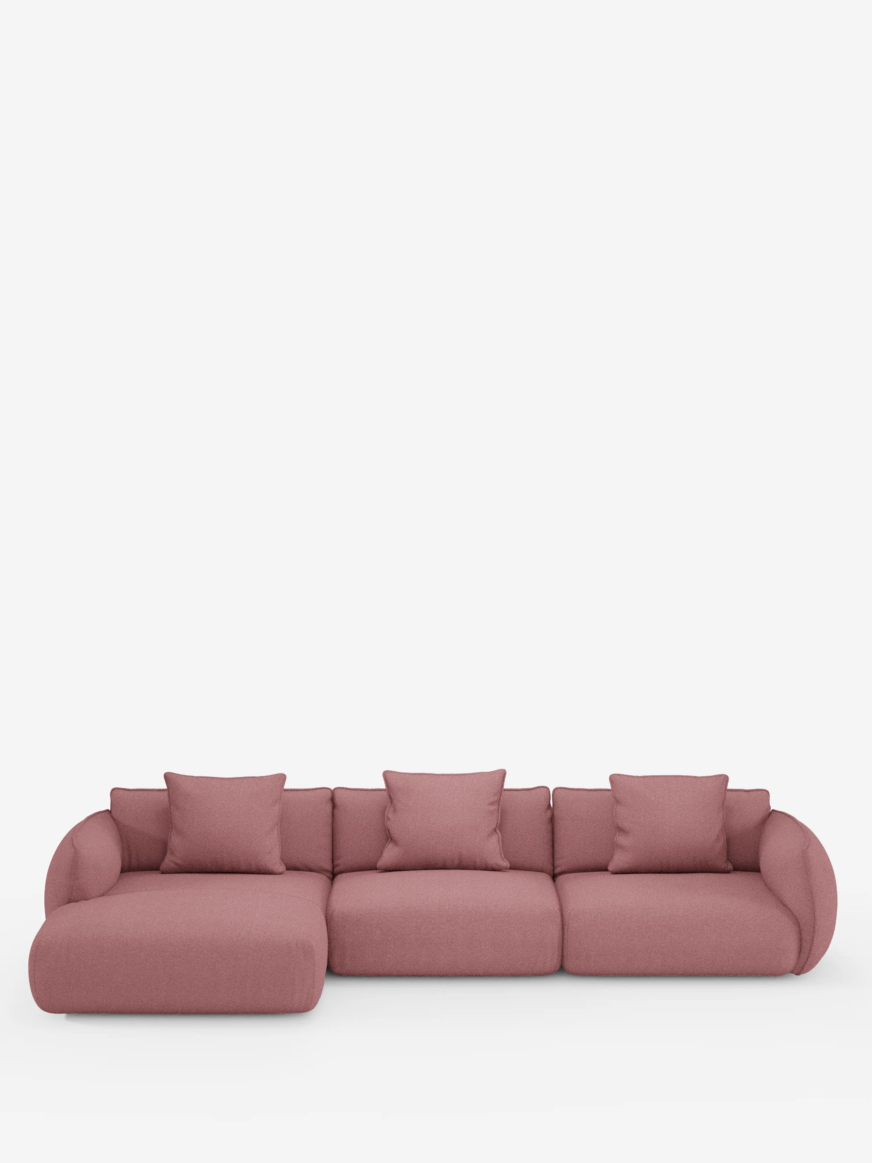 Il divano angolare con penisola componibile Nimbus di Divani.Store è un moderno divano a tre posti in rosa tenue, rivestito in morbido tessuto T33 effetto cotone resistente alle macchie. Caratterizzato da braccioli e schienali arrotondati, oltre a quattro cuscini quadrati coordinati, questo divano contemporaneo presenta il sedile più a sinistra che si estende verso l’esterno in stile chaise longue, il tutto su uno sfondo bianco a tinta unita.