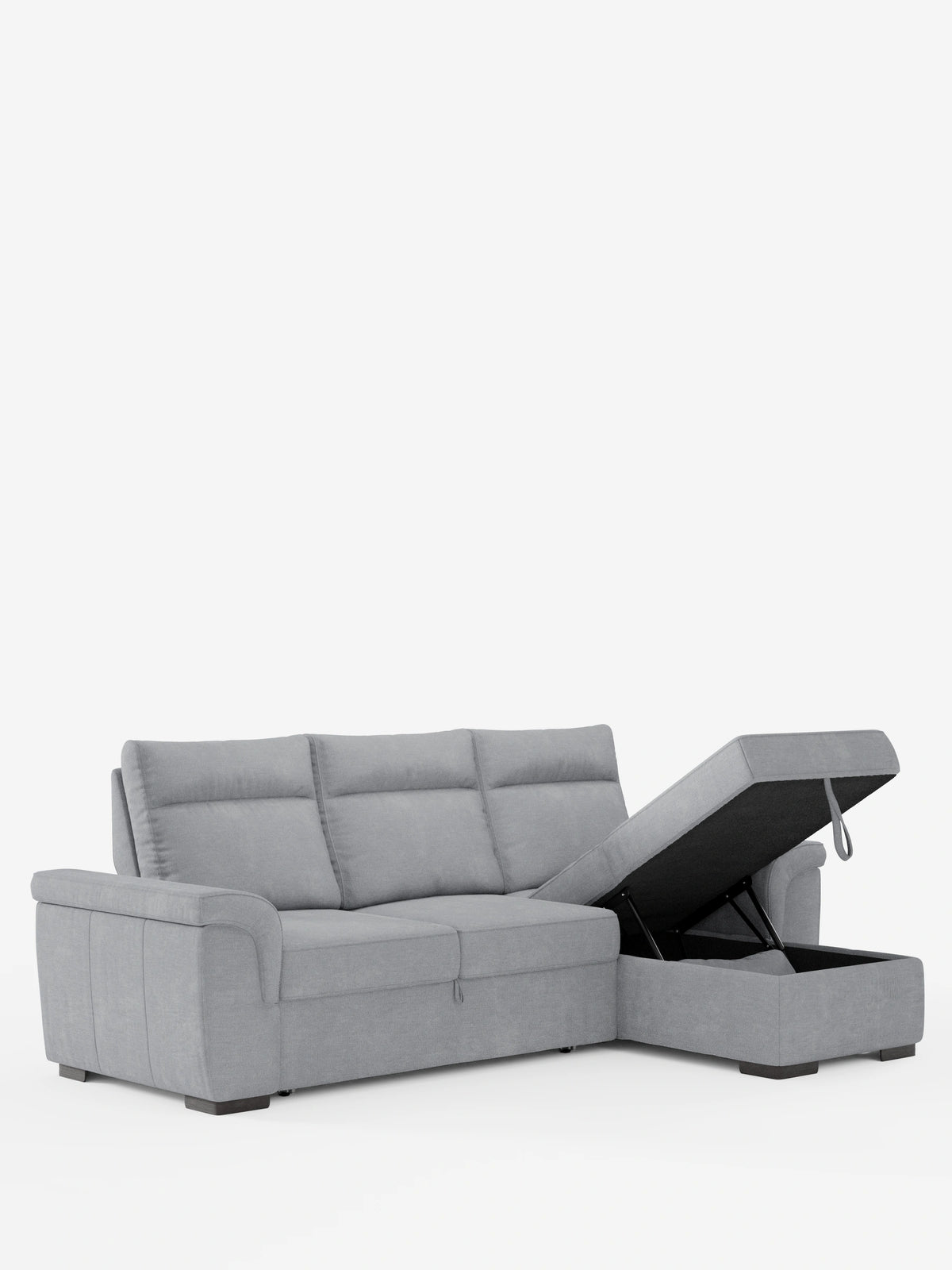 Un divano letto angolare “Ischia” grigio, con schienali scorrevoli, elemento estraibile e penisola contenitore in tessuto smacchiabile misto lino, spicca su uno sfondo bianco con la sua chaise longue apribile e gli schienali strutturati.
