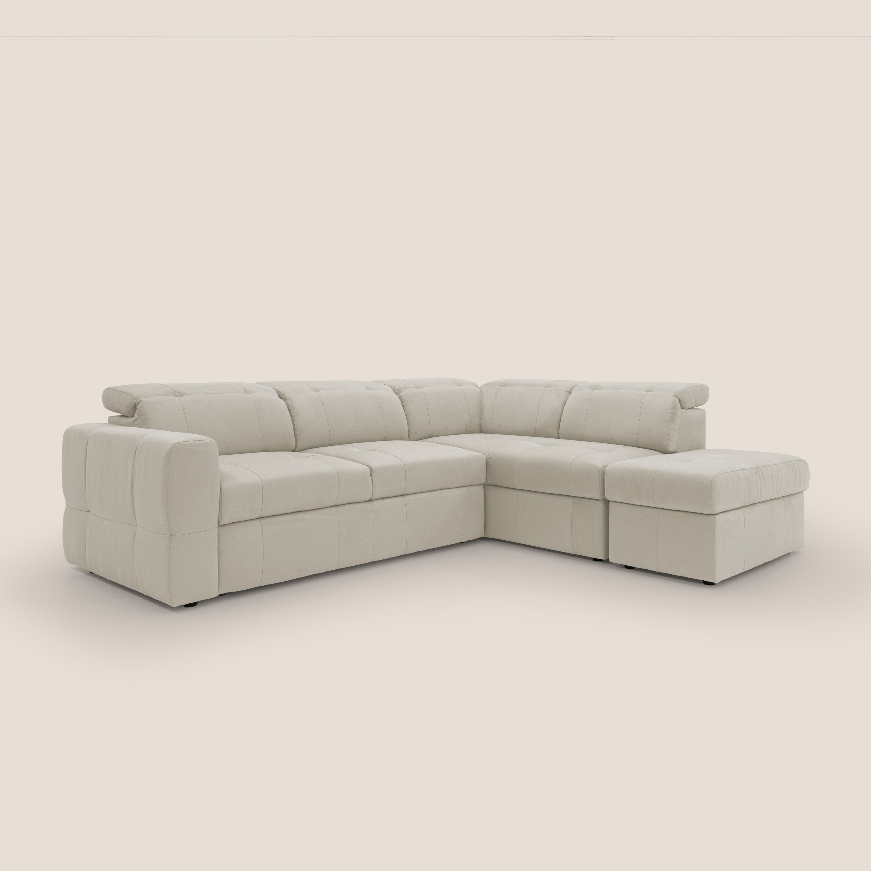 Kronos Divano angolare con poggiapiedi estraibile e pouf contenitore mobile in microfibra impermeabile T11 panna - divani.store