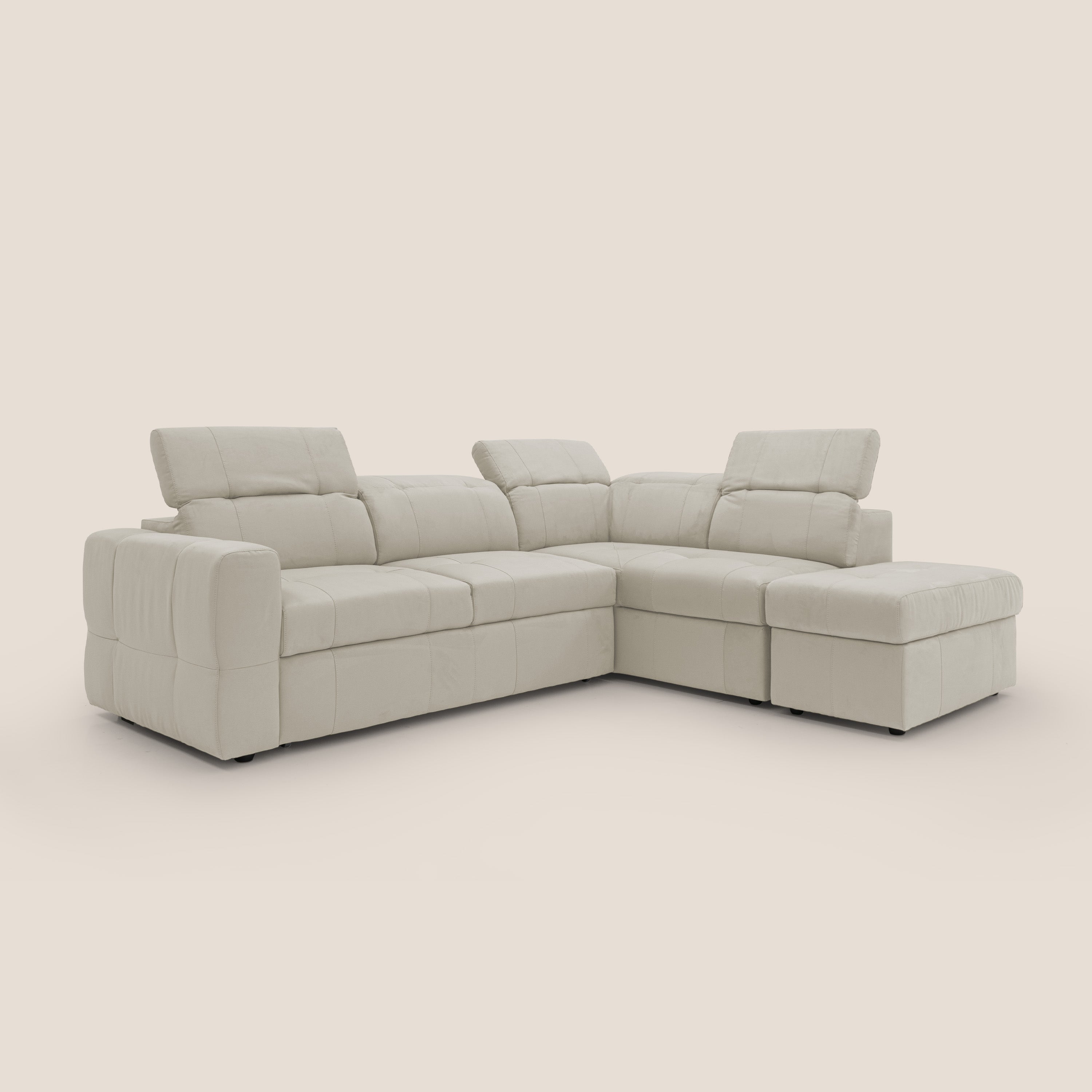 Kronos Divano angolare con poggiapiedi estraibile e pouf contenitore mobile in microfibra impermeabile T11 panna - divani.store