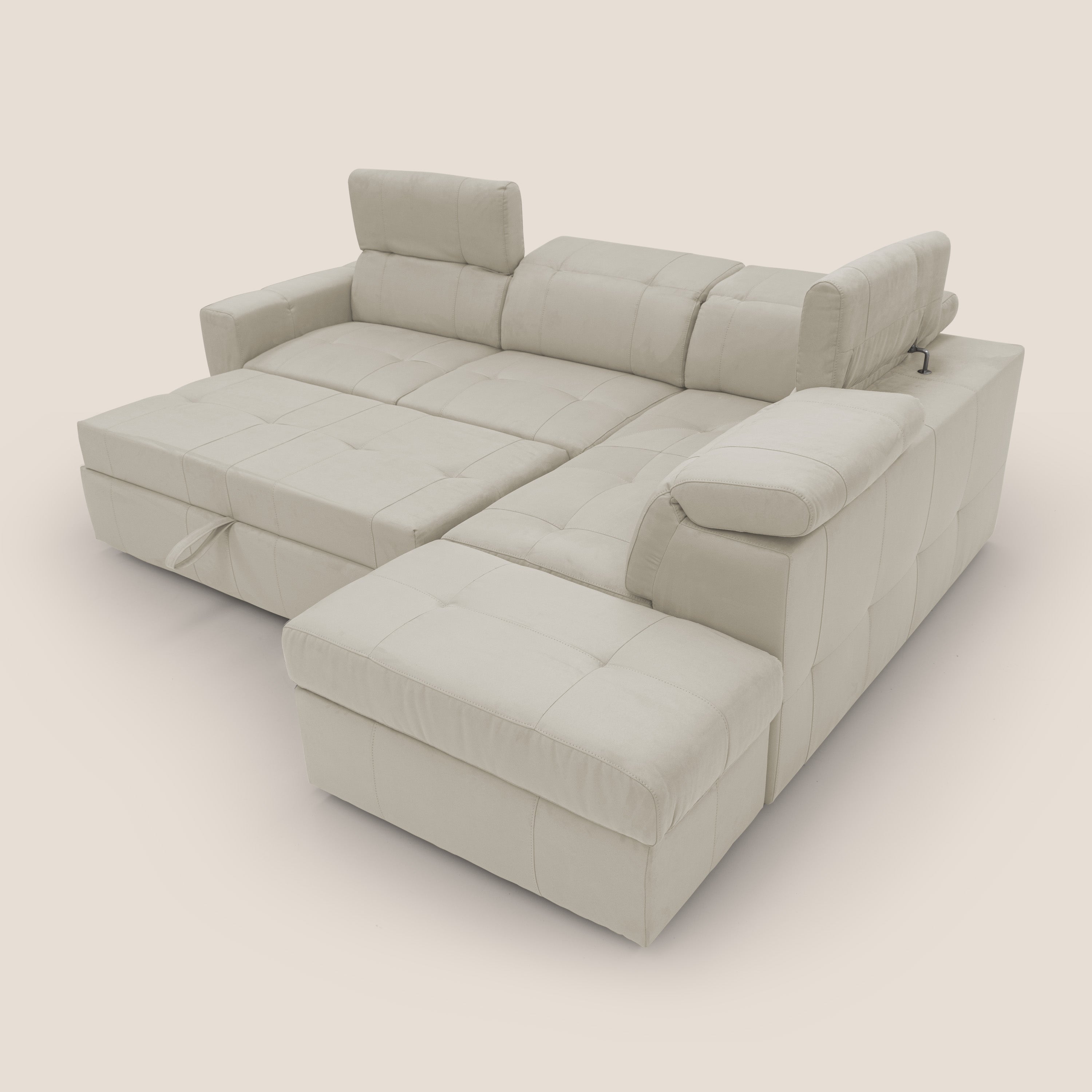 Kronos Divano angolare con poggiapiedi estraibile e pouf contenitore mobile in microfibra impermeabile T11 panna - divani.store