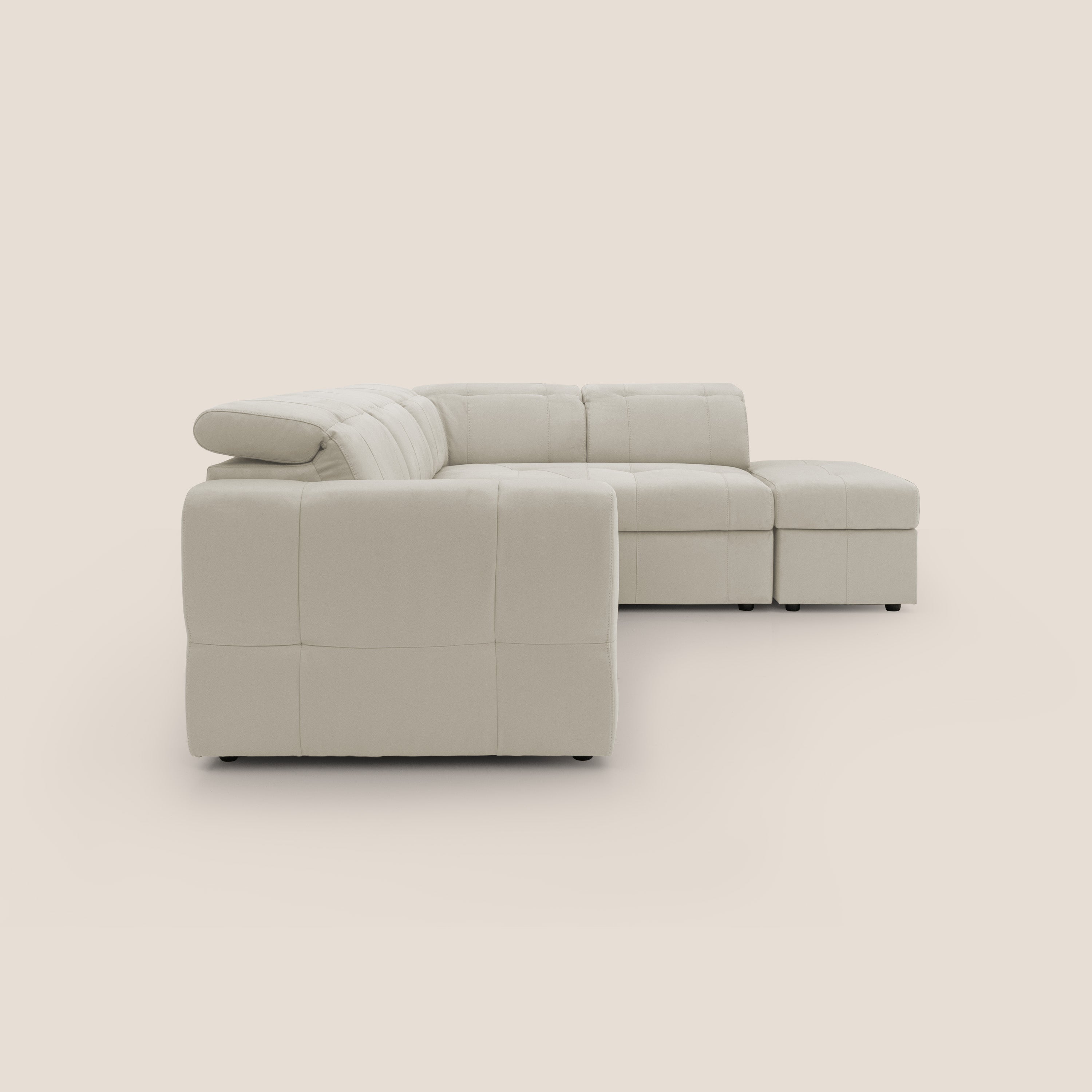 Kronos Divano angolare con poggiapiedi estraibile e pouf contenitore mobile in microfibra impermeabile T11 panna - divani.store