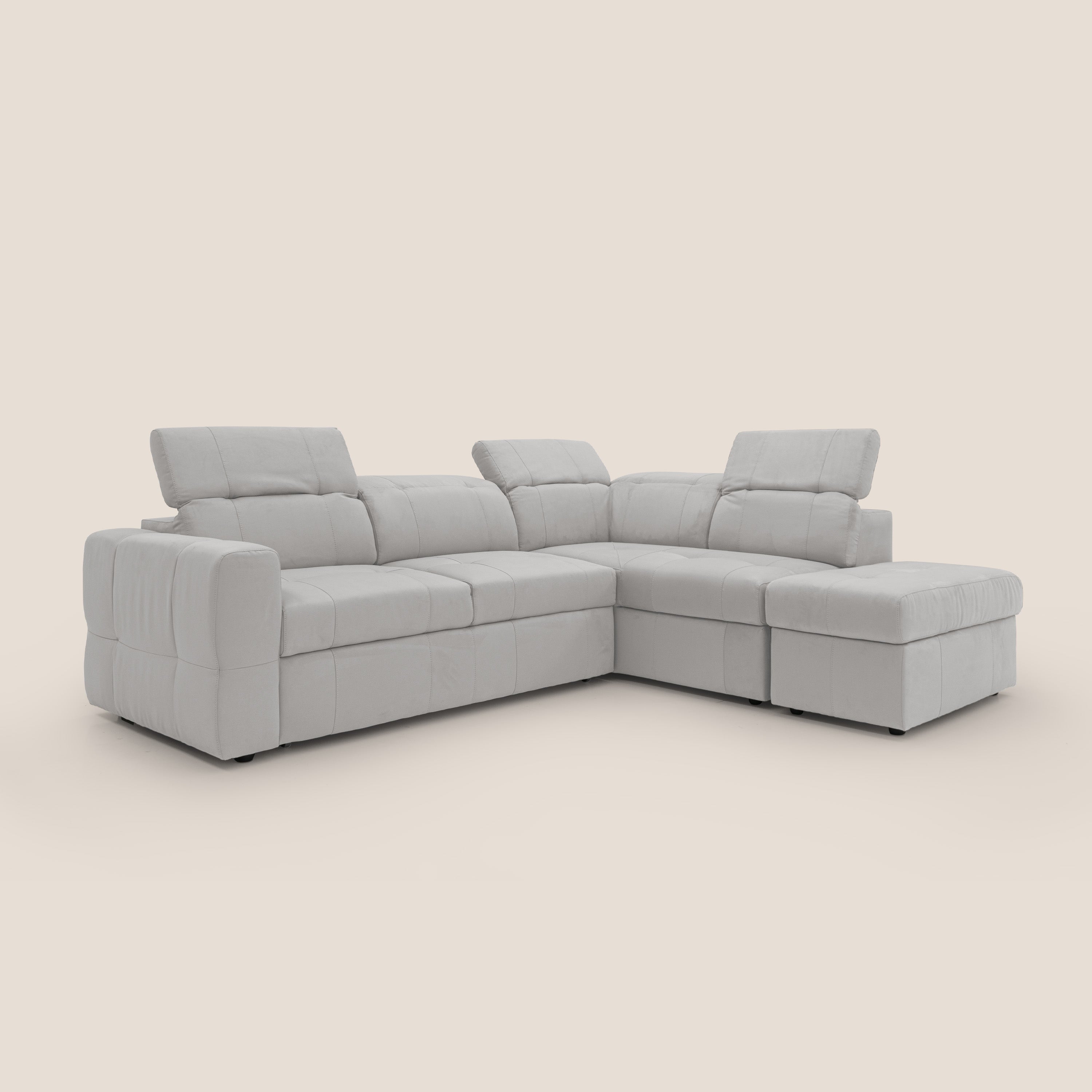 Kronos Divano angolare con poggiapiedi estraibile e pouf contenitore mobile in microfibra impermeabile T11 grigio chiaro - divani.store
