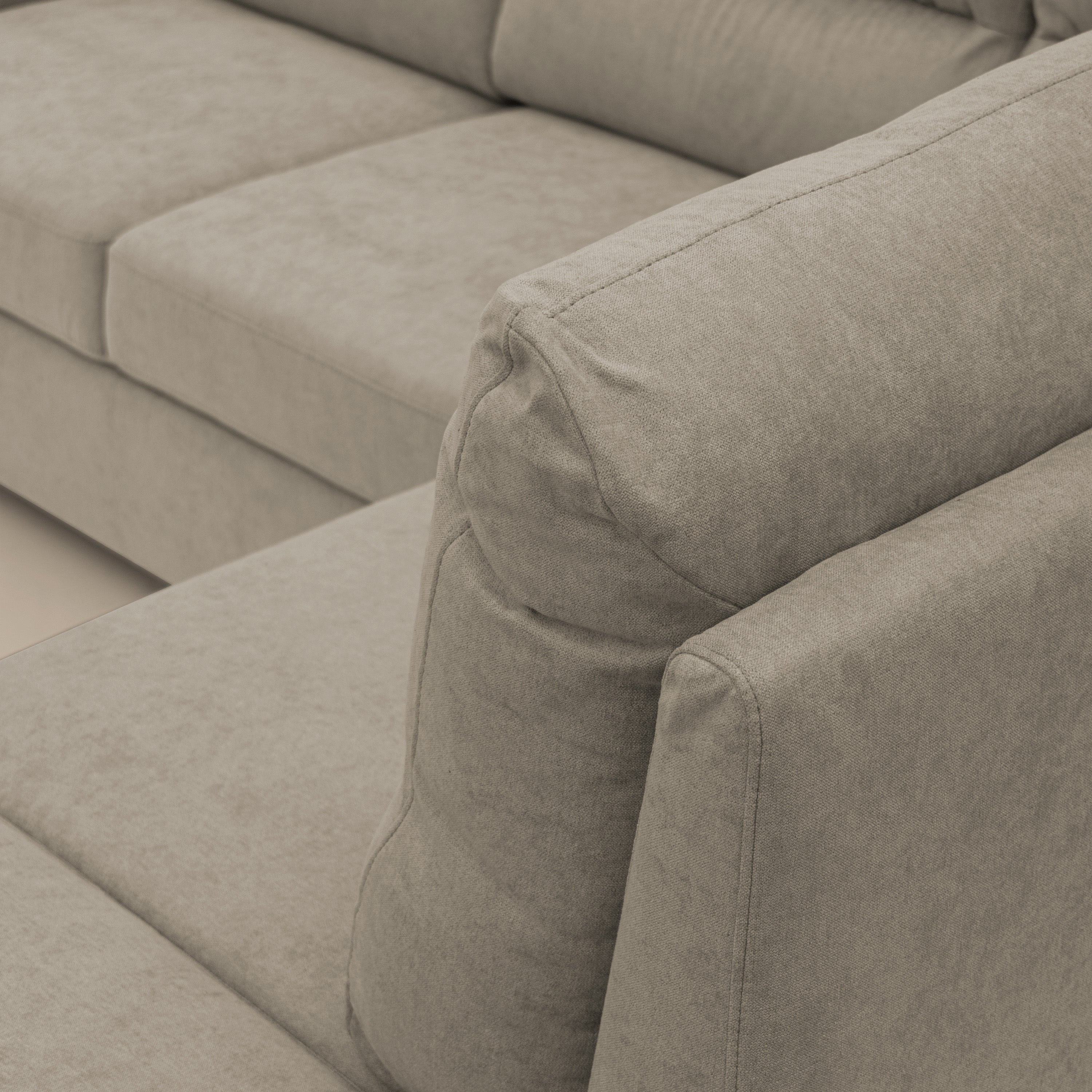 Minerva divano angolare con estraibile a cassettone e pouf contenitore in tessuto morbido impermeabile T02 panna - divani.store