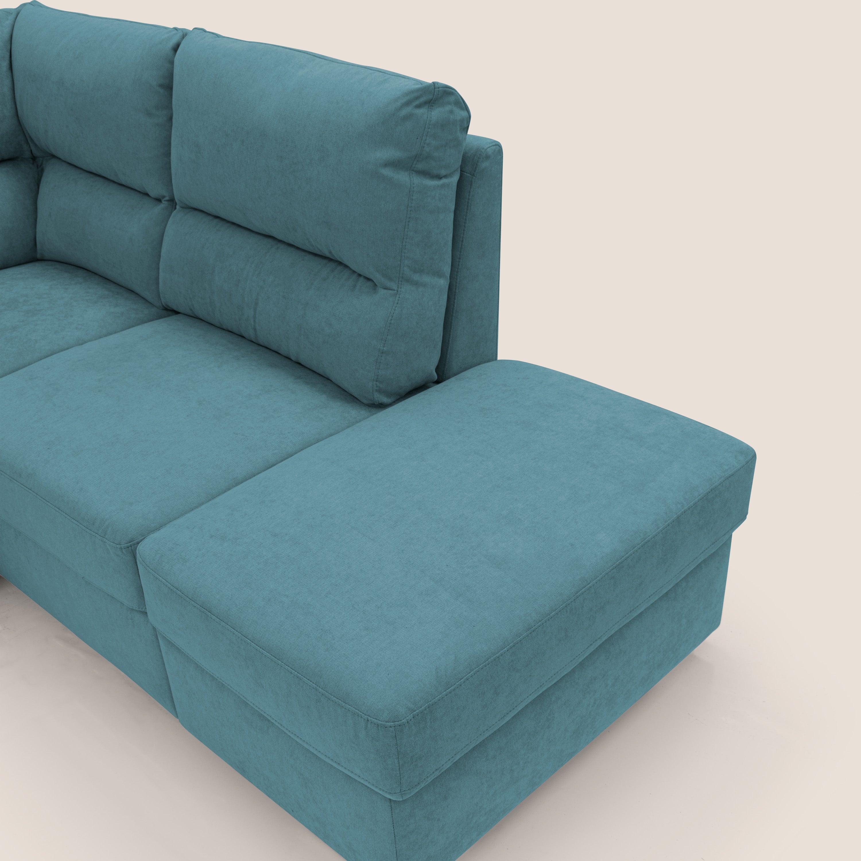 Minerva divano angolare con estraibile a cassettone e pouf contenitore in tessuto morbido impermeabile T02 azzurro - divani.store