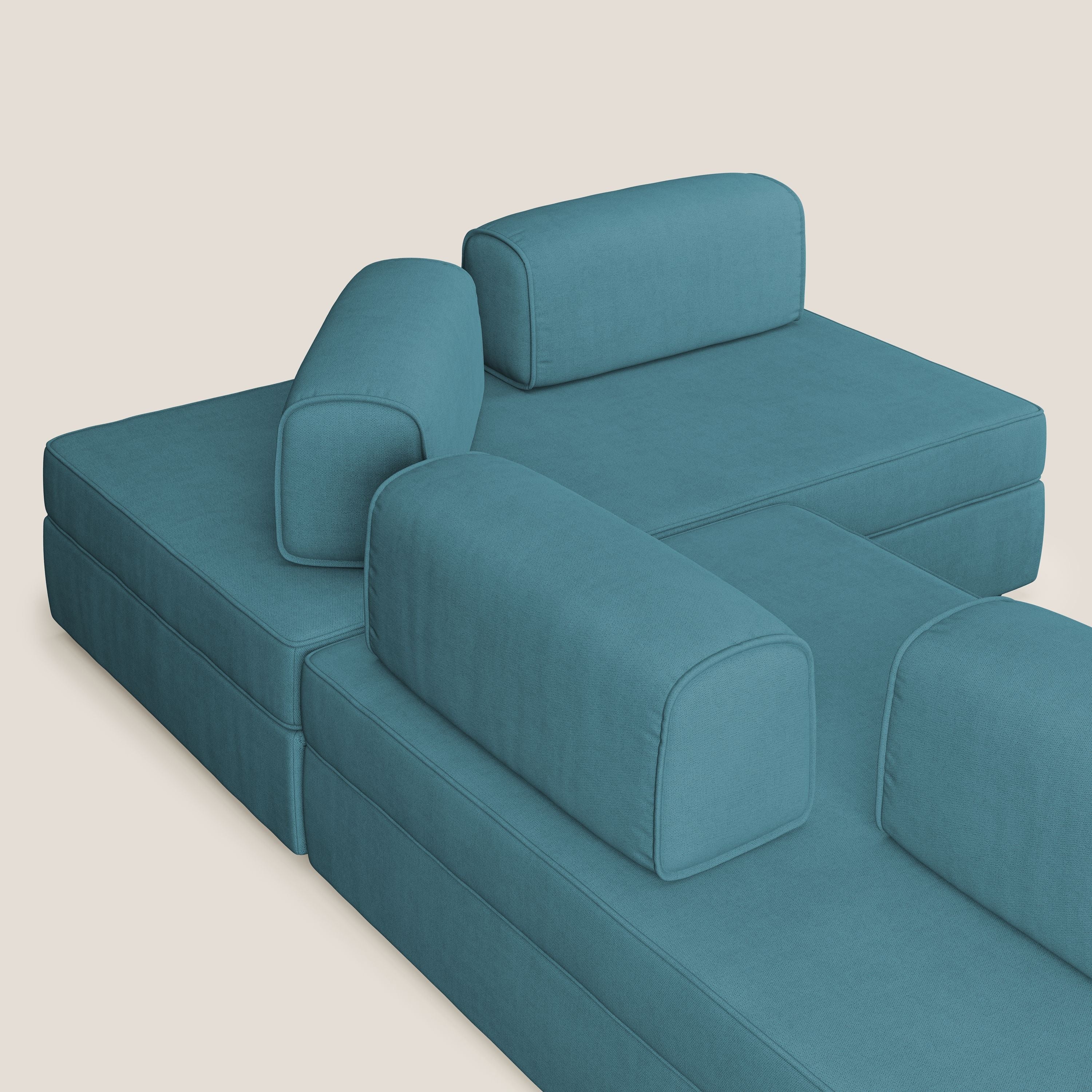 Liberty divano angolare con pouf estraibile e schienali movibili in tessuto morbido impermeabile T02 azzurro - divani.store