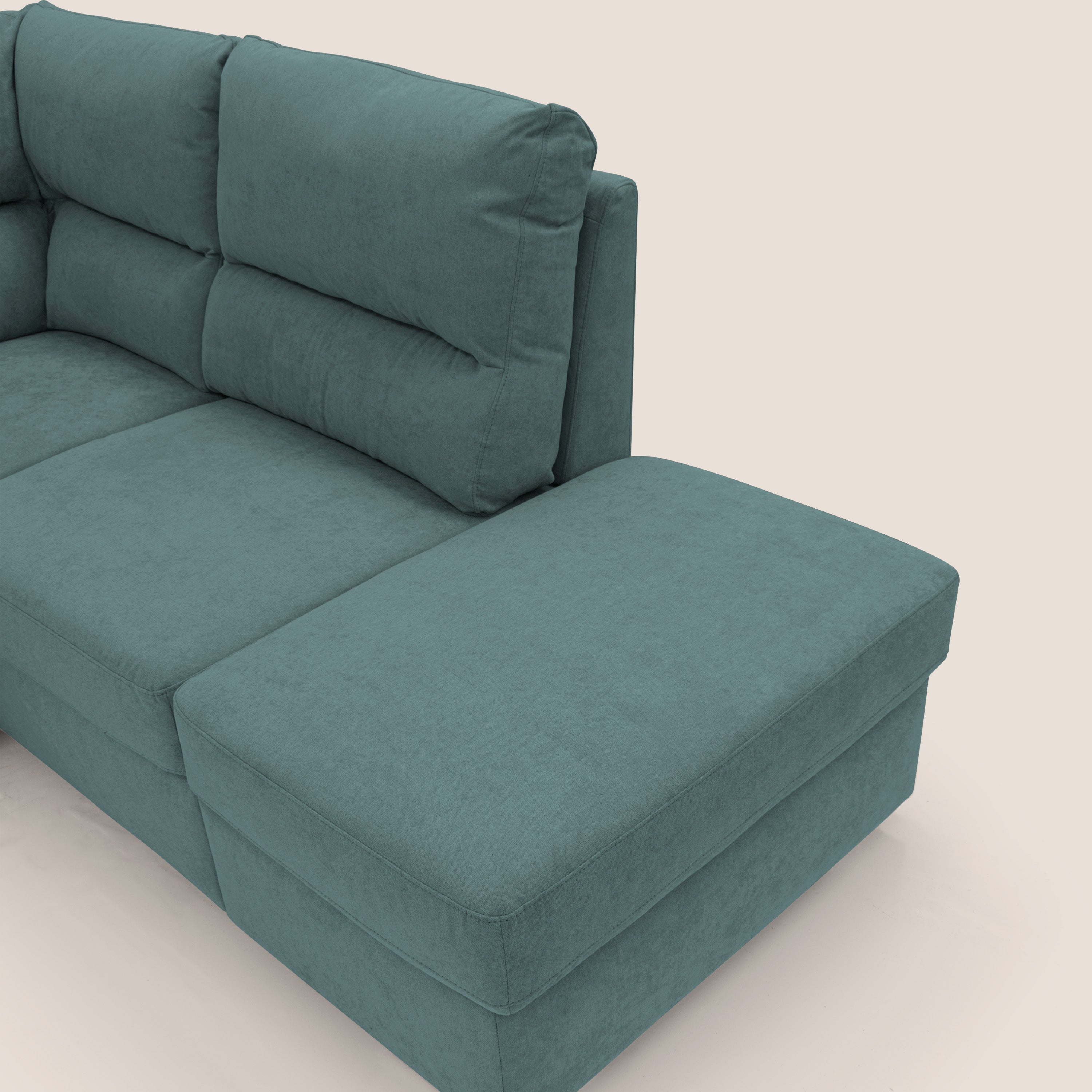 Minerva divano angolare con estraibile a cassettone e pouf contenitore in tessuto morbido impermeabile T02 petrolio - divani.store