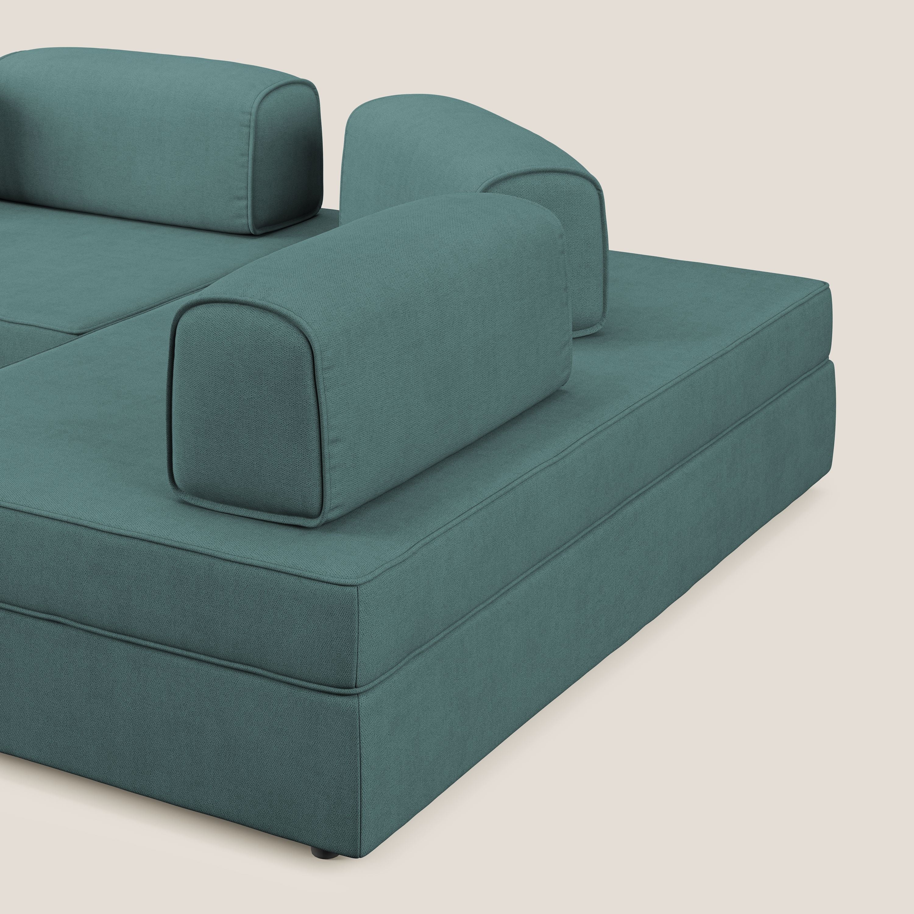 Liberty divano angolare con pouf estraibile e schienali movibili in tessuto morbido impermeabile T02 petrolio - divani.store