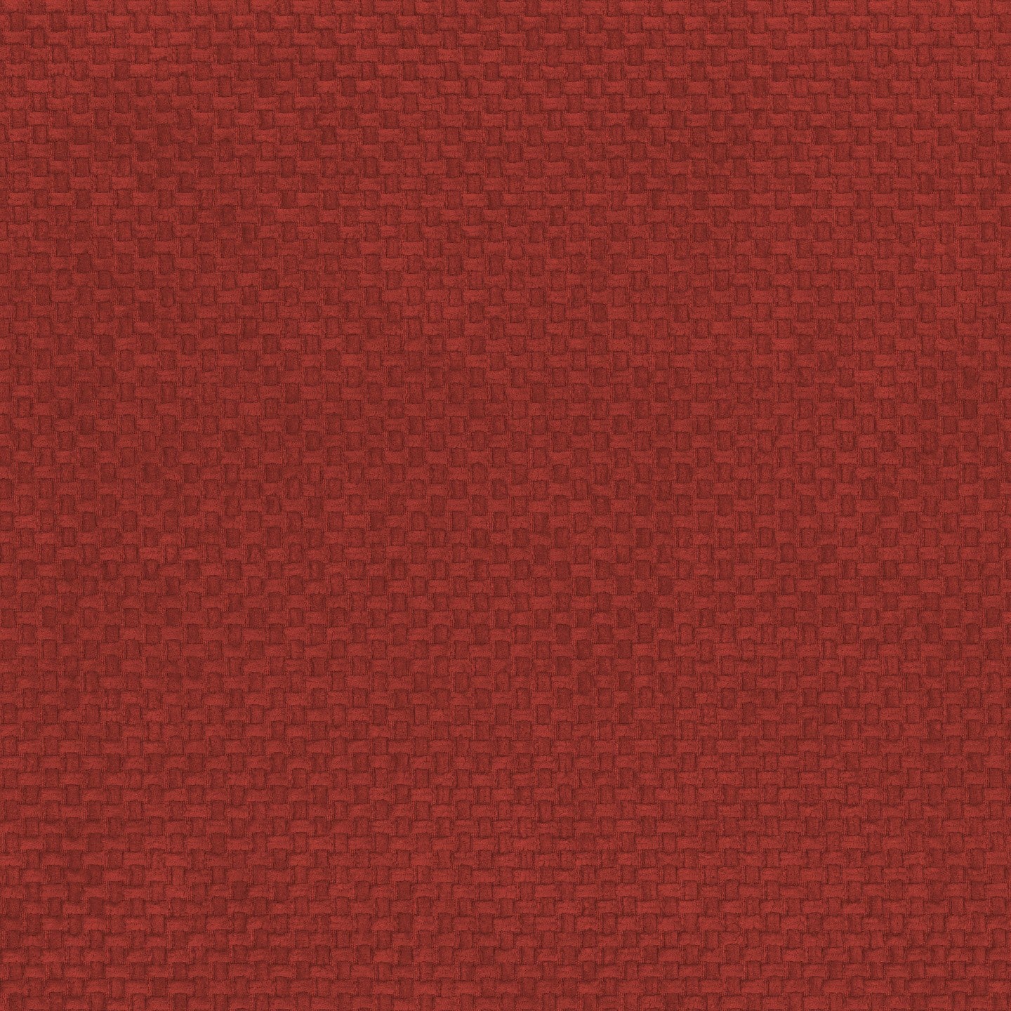 Primo piano del tessuto Personalizzazione in T26 di Divani.Store, che mostra una superficie rossa strutturata con un motivo a scacchiera intrecciato di piccoli rettangoli in rilievo. L'illuminazione esalta l'aspetto dimensionale dell'intero materiale.