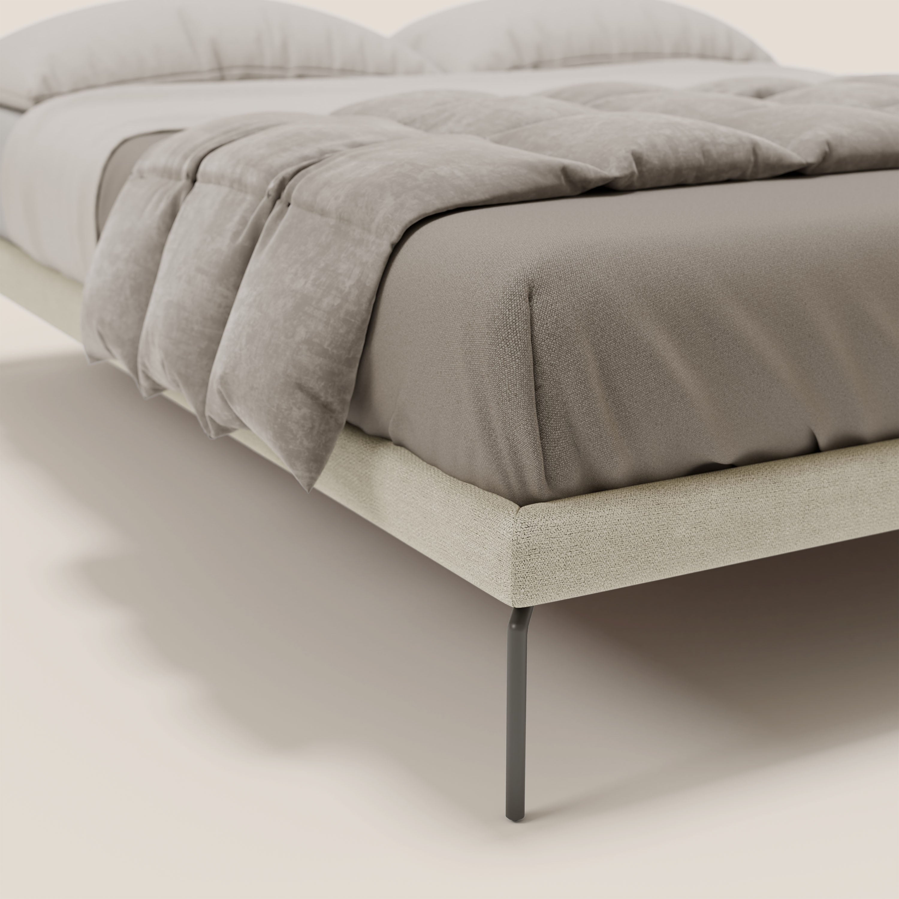 Il sommier sfoderabile Ring di Letti.store è caratterizzato da gambe alte 24 cm e da un tessuto impermeabile T14 panna. Questo letto moderno si inserisce in uno spazio minimale e neutro, vestito con lenzuola color tortora e piumone, in un'ottica di design italiano.