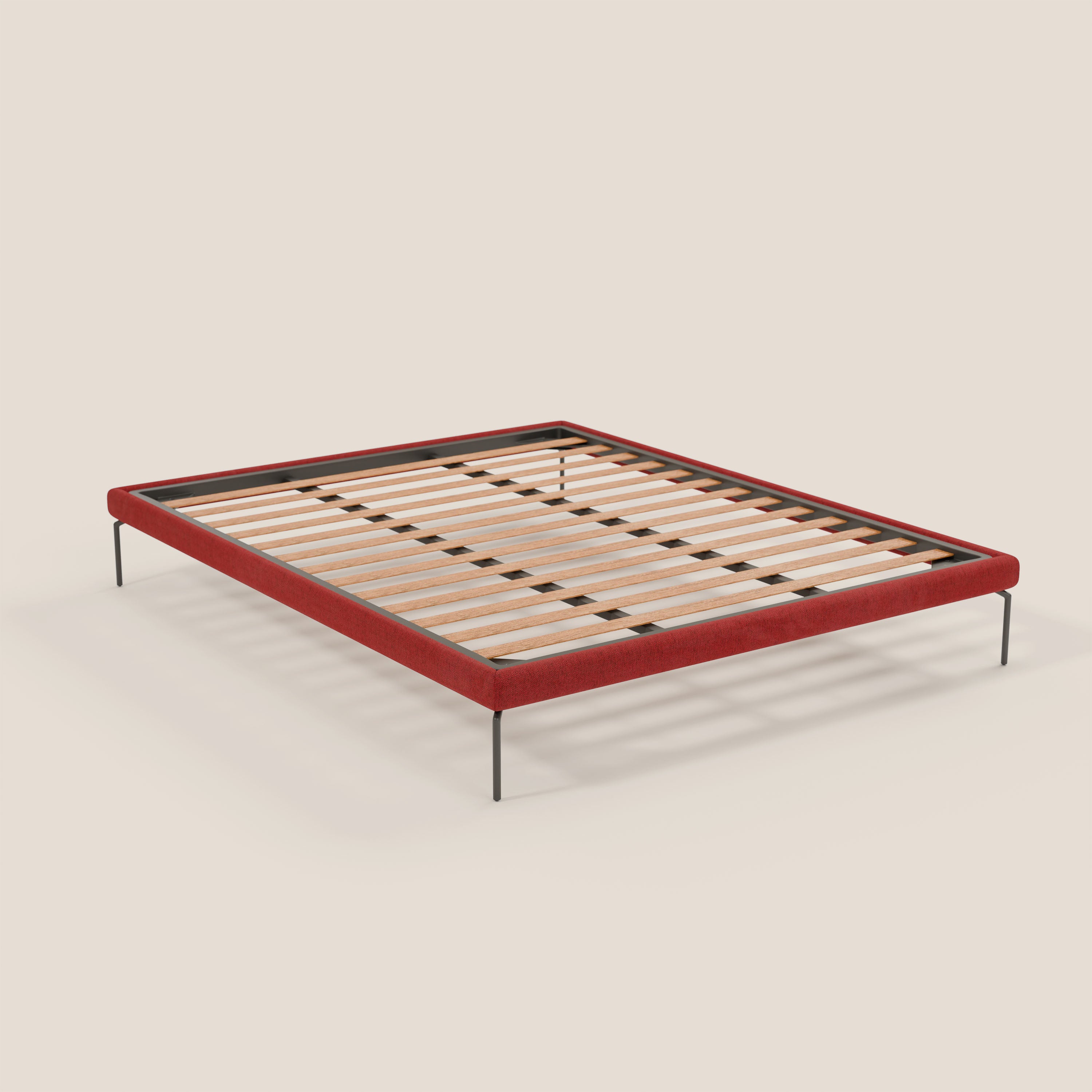 Il sommier sfoderabile Letti.store Ring è caratterizzato da gambe sottili in metallo nero alte 24 cm e da un bordo in tessuto impermeabile rosso T14. Di design italiano, ha doghe in legno chiaro uniformemente distanziate per il sostegno. Materasso e testiera non inclusi; fondo beige chiaro.