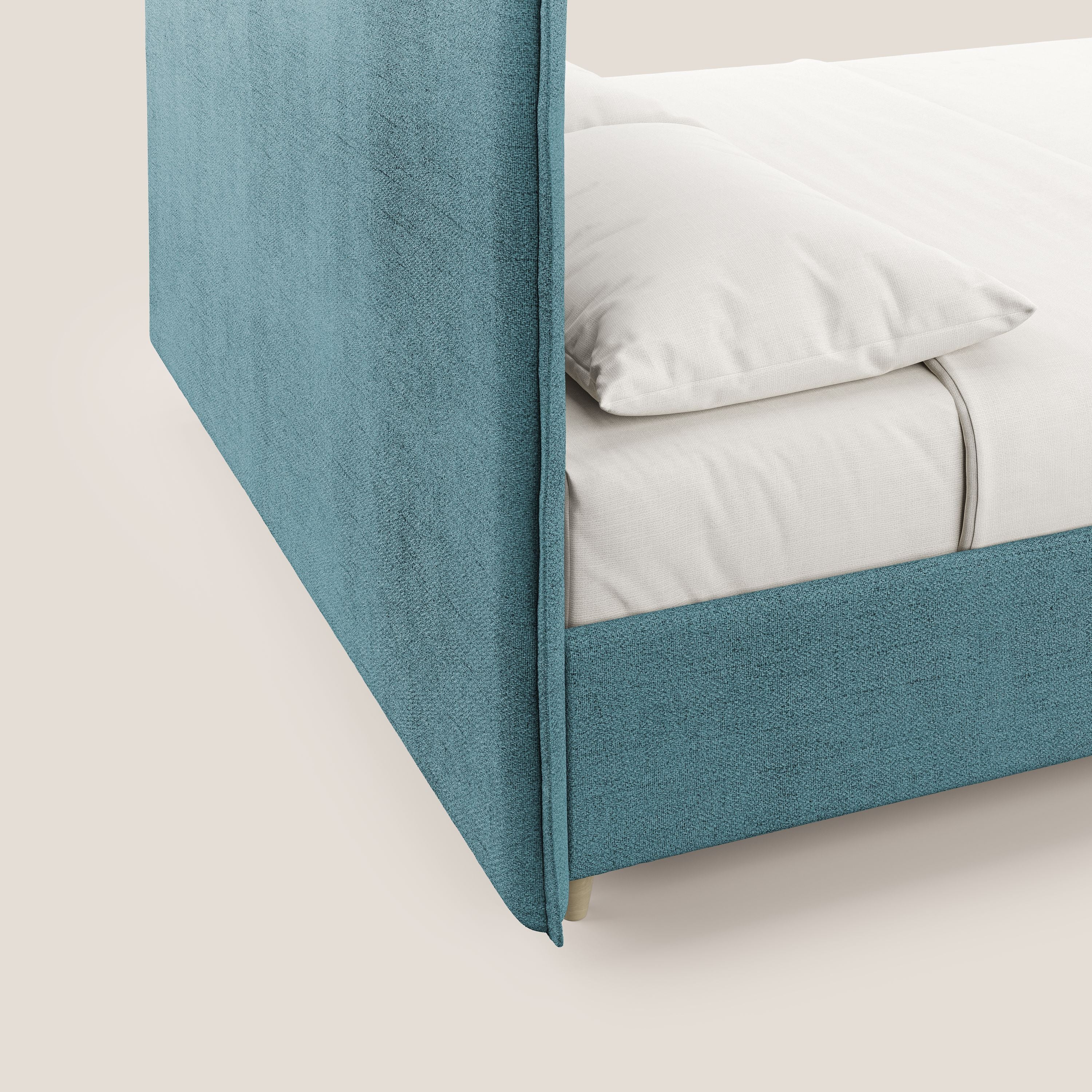 Audrey letto imbottito contenitore e sfoderabile in tessuto fiammato impermeabile T03 azzurro - divani.store