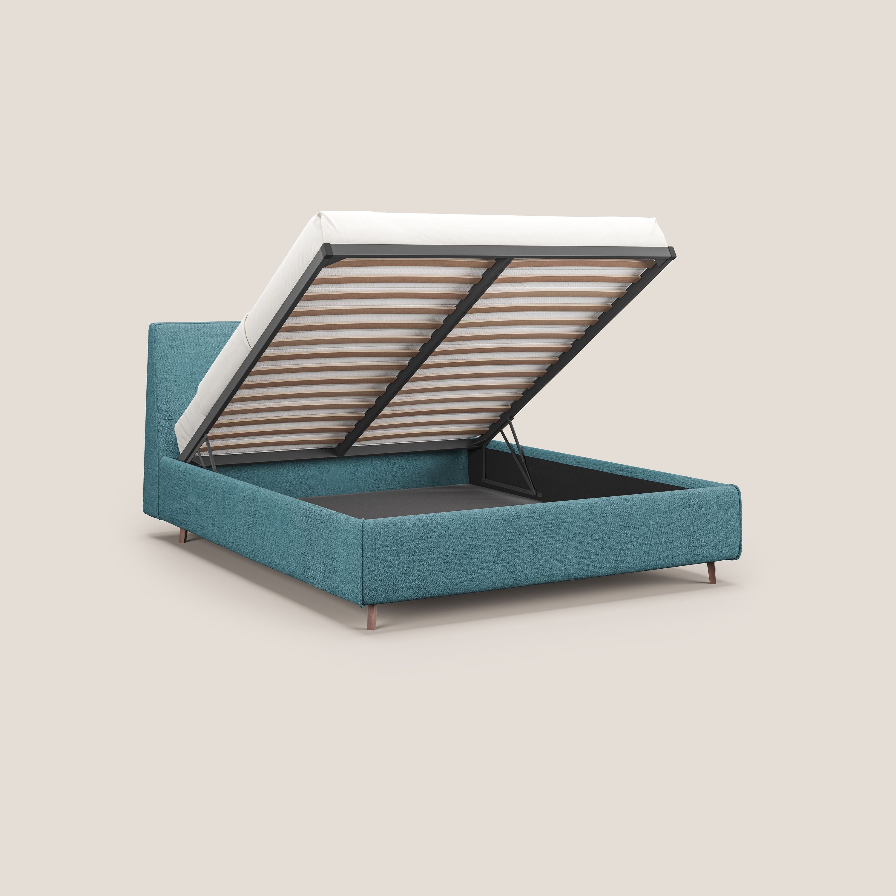 Justin letto imbottito contenitore e sfoderabile in tessuto fiammato impermeabile T03 azzurro - divani.store