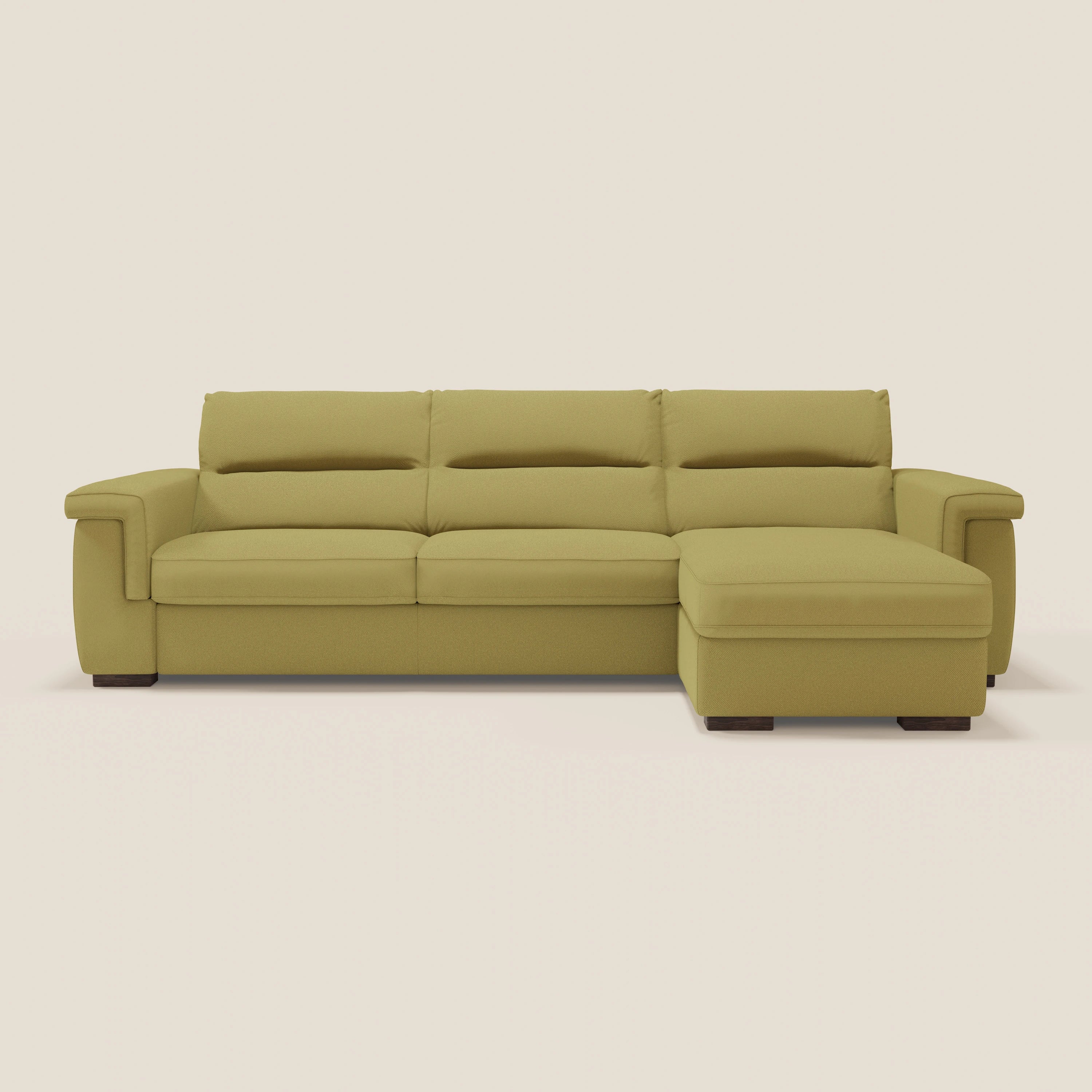 Il divano letto angolare Magnolia con penisola contenitore di Divani.Store è caratterizzato da tessuto antimacchia T05 giallo, tre cuscini di schienale, ampi braccioli, chaise longue a destra, gambe corte e scure e materasso H18 cm, perfetto per un comfort profondo.