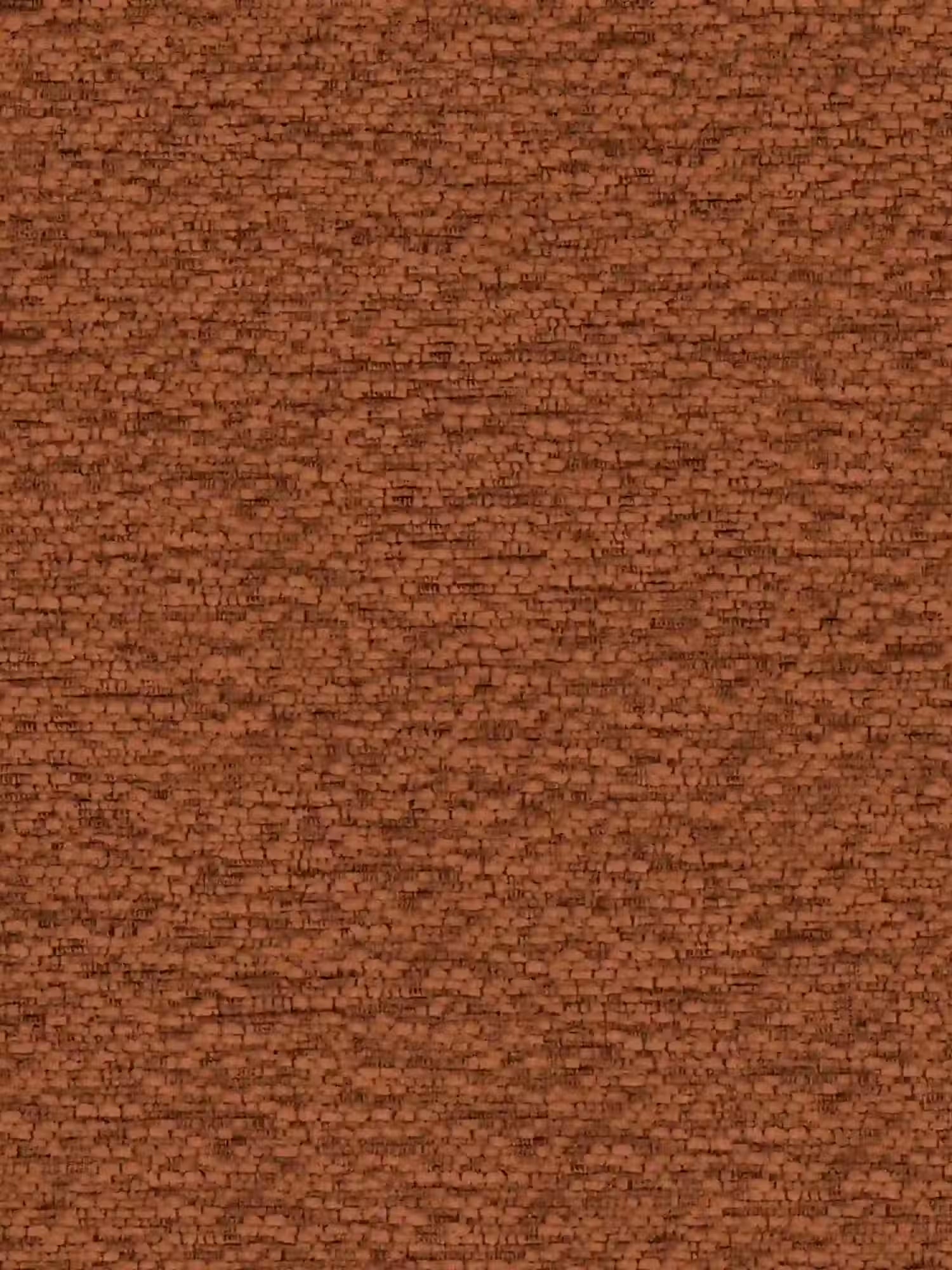 Primo piano di un muro di mattoni color bruno-rossastro con una struttura uniforme e ben compatta. Ogni mattone è rettangolare e allineato orizzontalmente, con le fughe di malta visibili che creano una superficie ruvida e ricca di texture, che ricorda la tappezzeria curata nei minimi dettagli del letto imbottito ZAYRON con vano contenitore e morbidi cuscini regolabili di Letti.store. Il colore rimane uniforme su tutta la superficie, proprio come il tessuto di alta qualità certificato Oeko-Tex® di questo