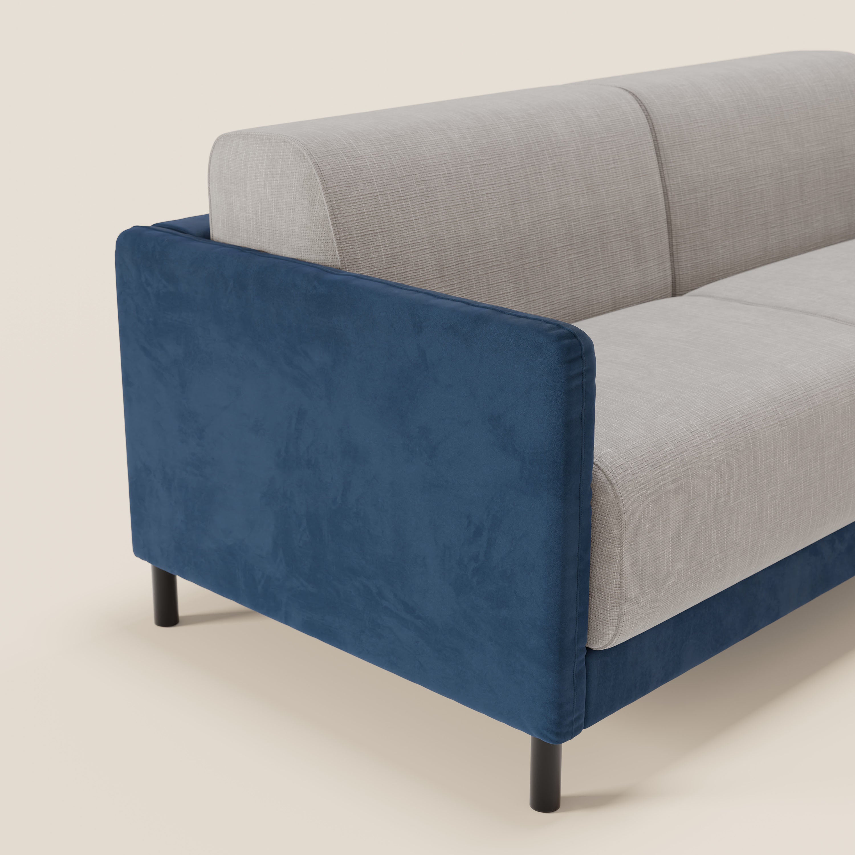 Il divano letto Narciso di Divani.Store è caratterizzato da un design bicolore con struttura in microfibra lavabile, elegante tessuto impermeabile T06 nei colori blu e grigio chiaro, sottili gambe nere e materasso H18 cm per il massimo comfort.