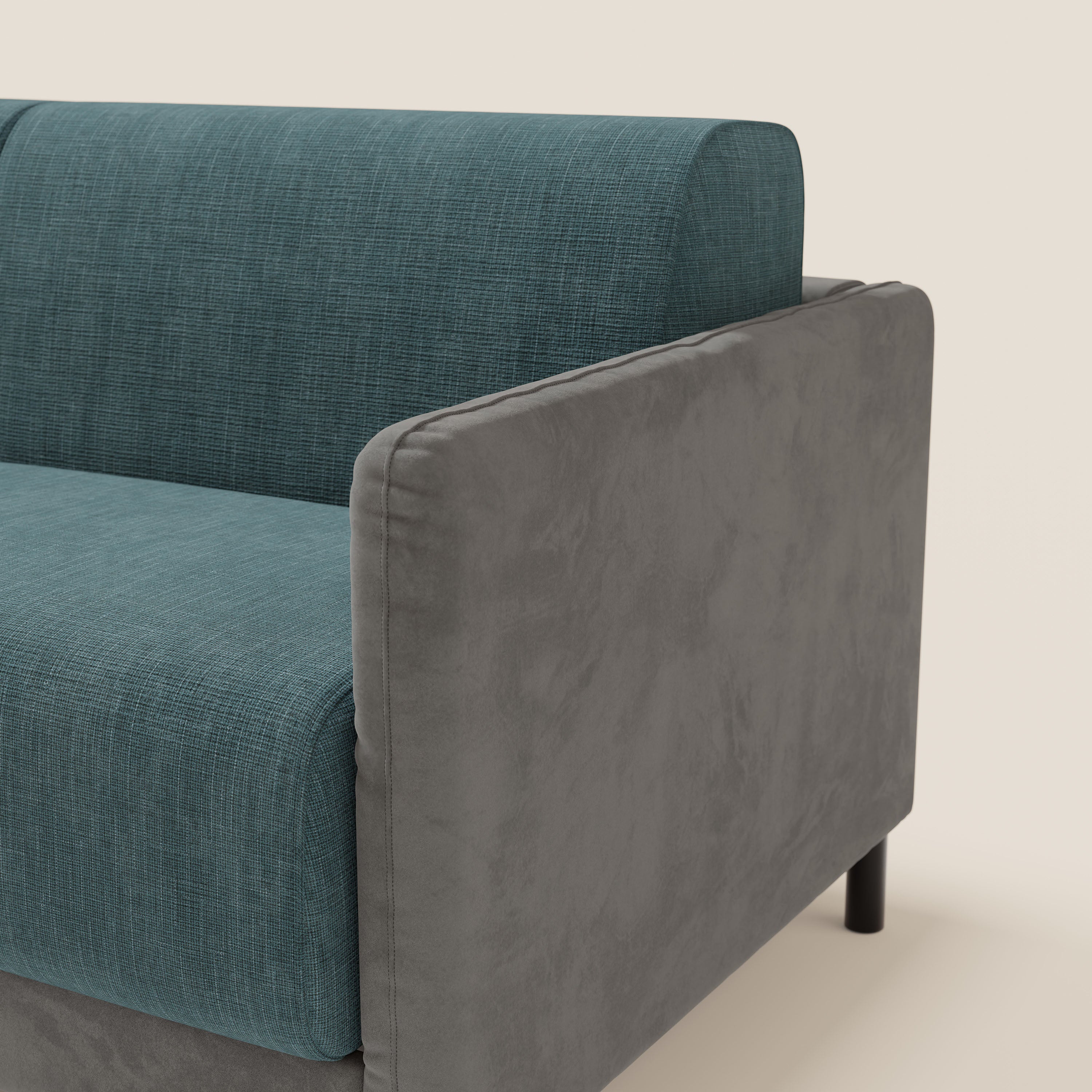 Il divano letto Narciso di Divani.Store è caratterizzato da microfibra bicolore, rivestimento impermeabile T06 grigio scuro e blu, materasso H18 cm e linee pulite con gambe cilindriche nere, su sfondo bianco sporco.