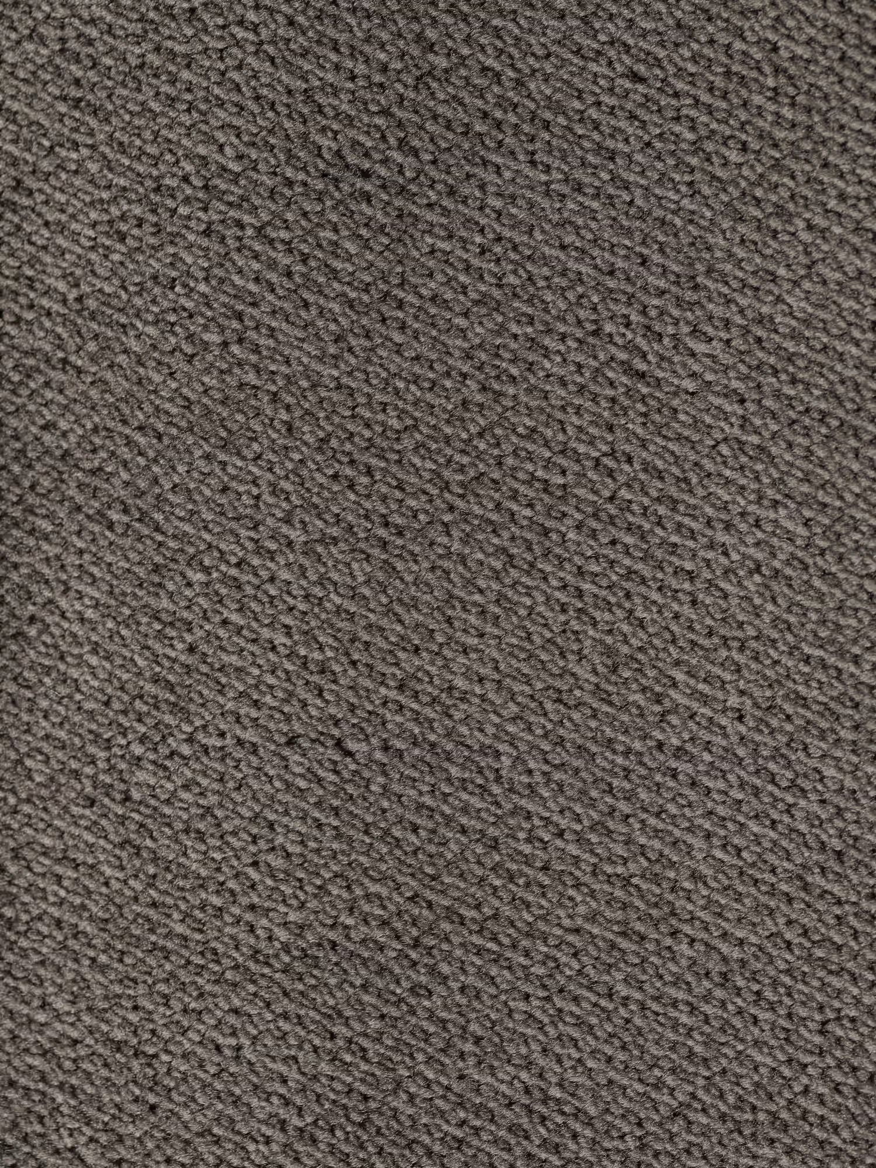 Primo piano del raffinato tessuto grigio effetto velluto smacchiabile (T30) del divano angolare con penisola e sedute estensibili “Michelangelo” di Divani.Store. La superficie a trama fitta presenta un delicato motivo diagonale in rilievo che garantisce resistenza e un fascino contemporaneo, ideale per i rivestimenti moderni. Il colore è uniforme e opaco su tutta la superficie, in perfetta armonia con il design elegante e in grado di esaltare sia lo stile che la resistenza all’usura.
