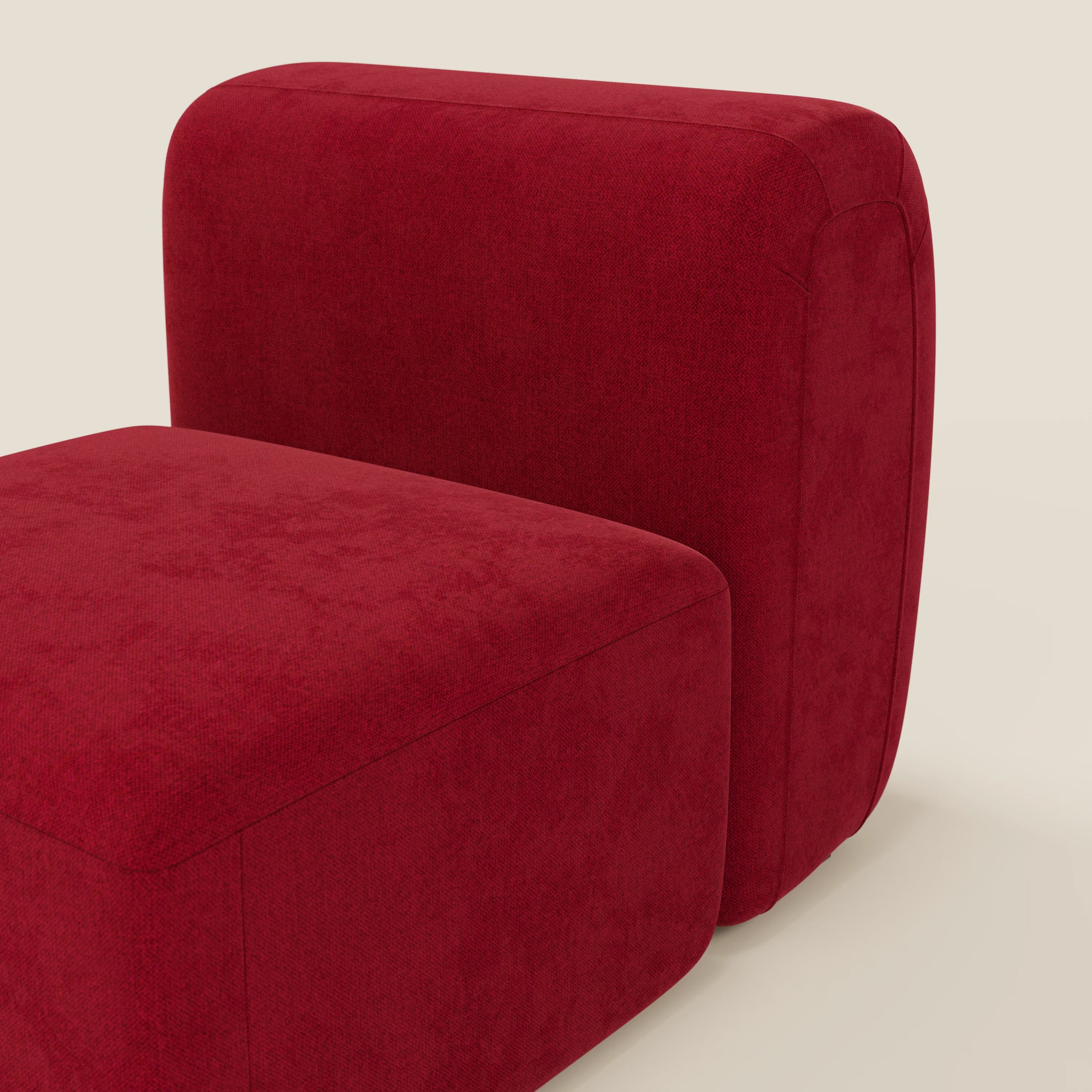 BonBon modulo centrale 70 cm di Divani.Store è una poltrona o un elemento modulare in tessuto antimacchia T23 bordeaux, con bordi lisci e arrotondati su uno sfondo beige chiaro.