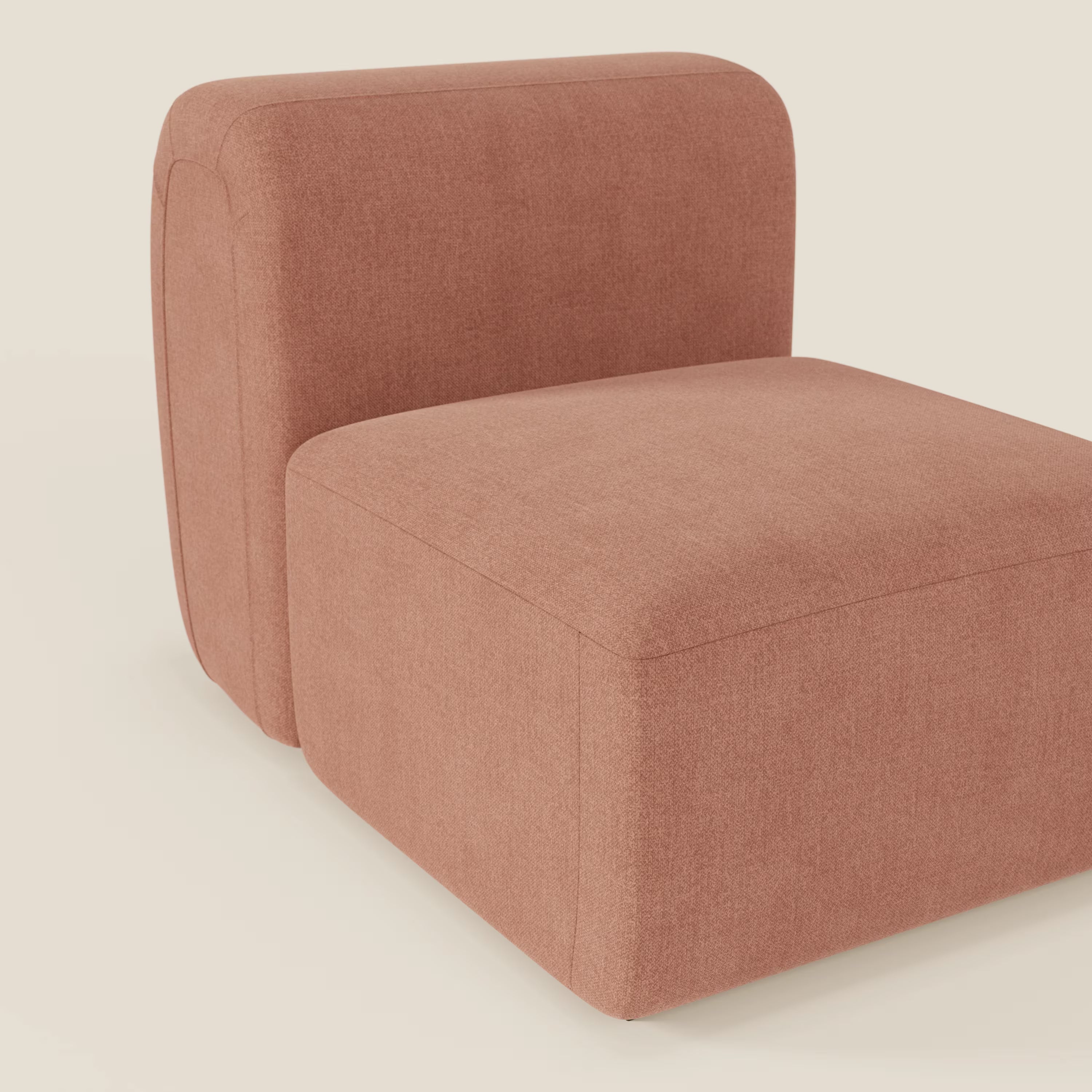 BonBon modulo centrale 70 cm di Divani.Store è una moderna poltrona senza braccioli con bordi morbidi e arrotondati, ampia seduta e schienale rettangolare. Rivestita in tessuto T23 pesca, facile da pulire, ha un design minimalista su uno sfondo neutro e chiaro.