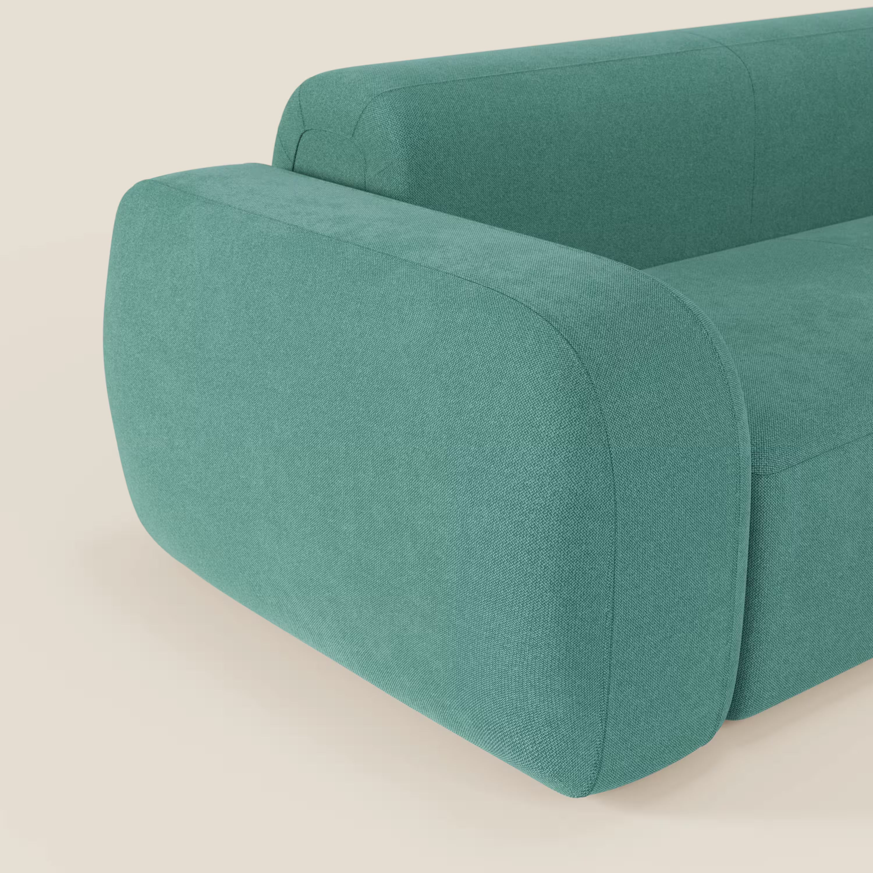 Primo piano del BonBon Divano modulare Lineare 220 di Divani.Store, caratterizzato da una seduta singola in tessuto antimacchia T23 verde acqua, con bordi lisci e arrotondati e braccioli spessi. Il suo design contemporaneo e pulito spicca su uno sfondo chiaro.