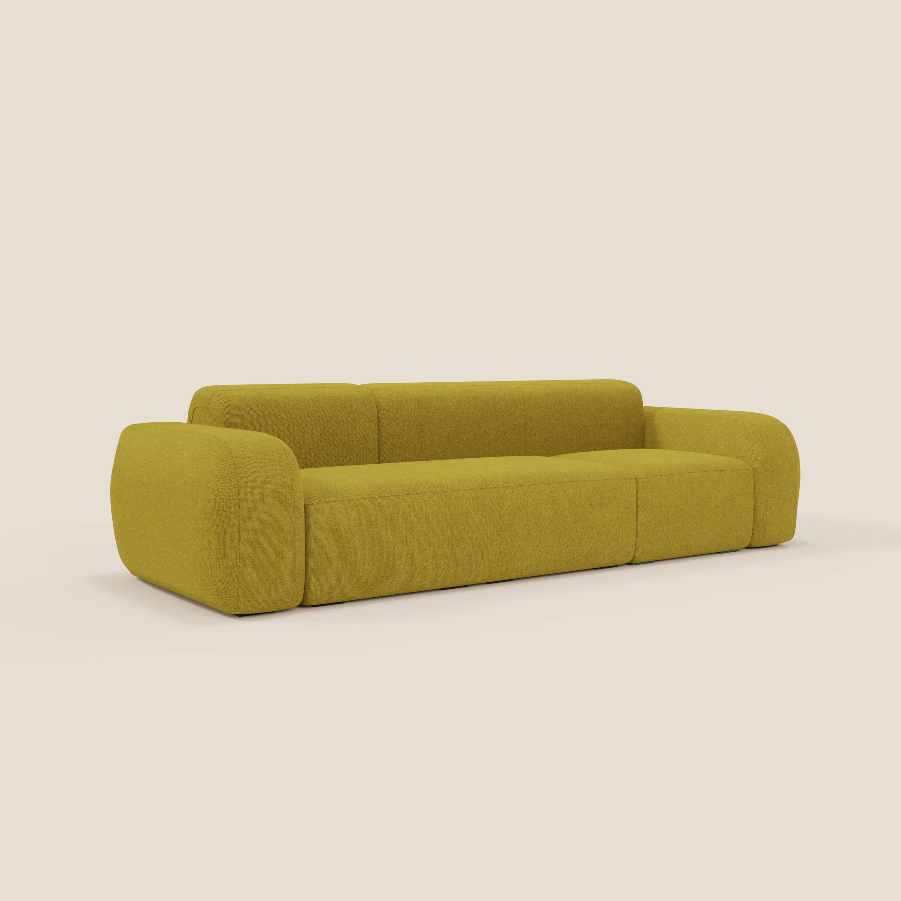 Il BonBon Divano modulare componibile - Composizione Spaccamattone in tessuto smacchiabile T23 giallo sole di Divani.Store è caratterizzato da braccioli e schienale spessi e arrotondati, cuscini morbidi e un design liscio e minimalista su sfondo bianco sporco.