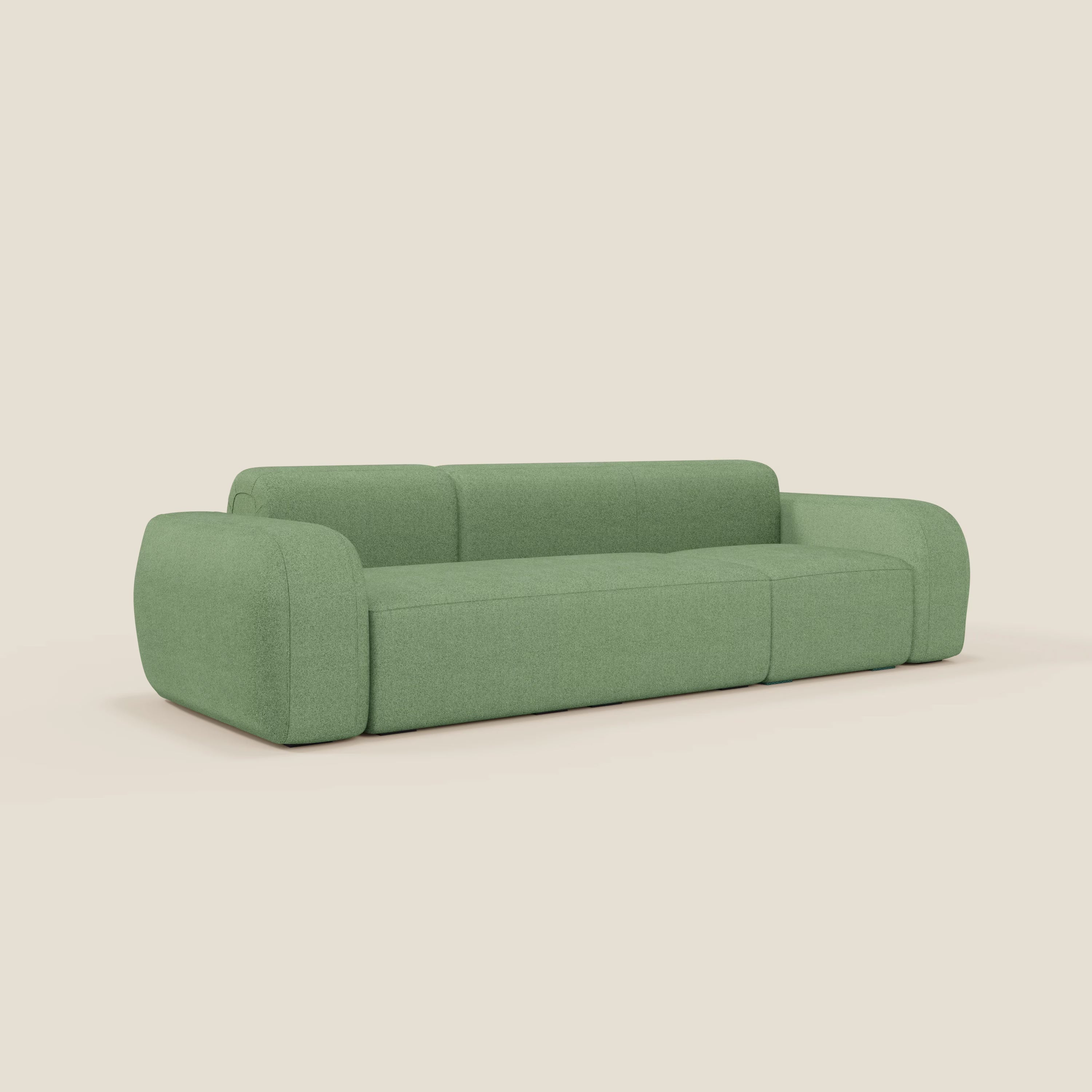 Il BonBon Divano componibile - Composizione Spaccamattone in tessuto smacchiabile T23 menta di Divani.Store è caratterizzato da un design moderno e minimalista con bordi arrotondati e tessuto peluche color menta su uno sfondo bianco sporco.
