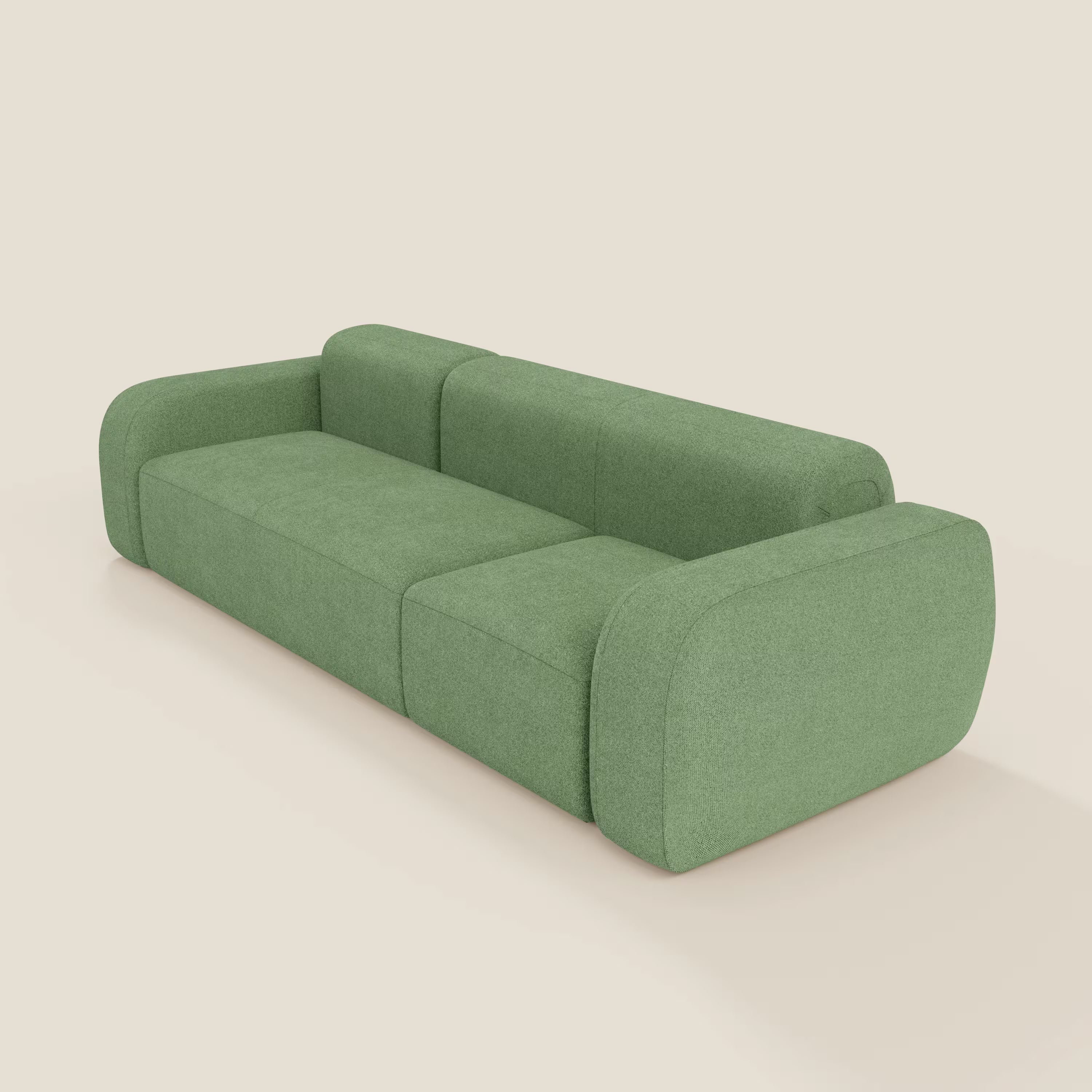 Il divano componibile BonBon Divani.Store in tessuto smacchiabile T23 menta presenta un design moderno e minimalista con braccioli e schienale arrotondati, imbottitura liscia e linee pulite per un invitante look geometrico.