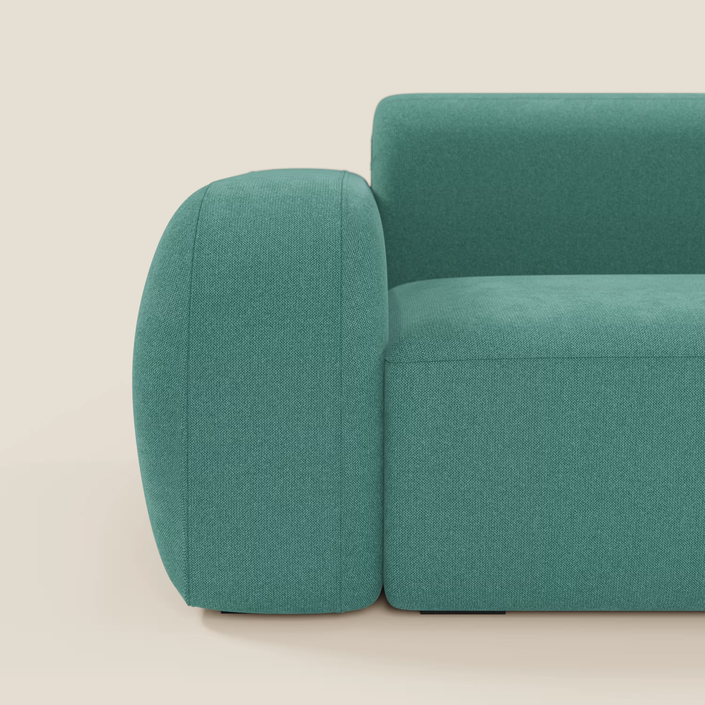 Un primo piano del BonBon Divano modulare componibile - Composizione Spaccamattone in tessuto smacchiabile T23 verde acqua di Divani.Store ne evidenzia il design unico, le linee eleganti e lo stile versatile e moderno.