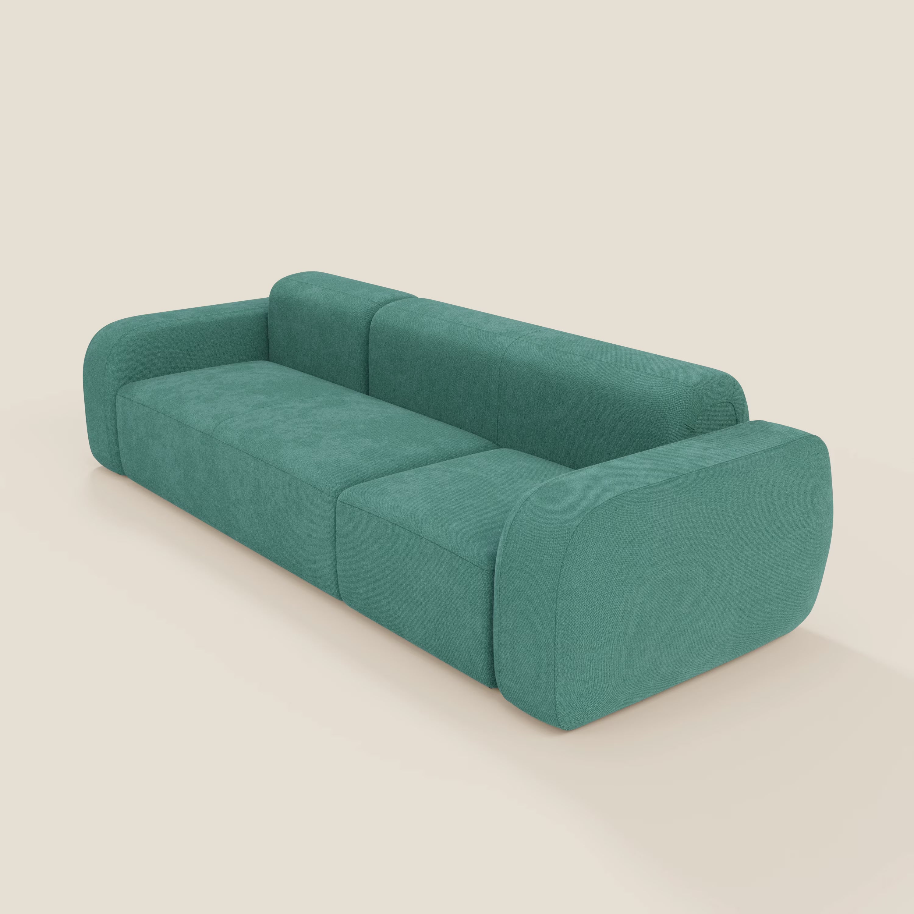 Il BonBon Divano componibile - Composizione Spaccamattone in tessuto smacchiabile T23 verde acqua di Divani.Store è un divano moderno color verde acqua con braccioli e schienale arrotondati, tre cuscini di seduta e un design minimalista.