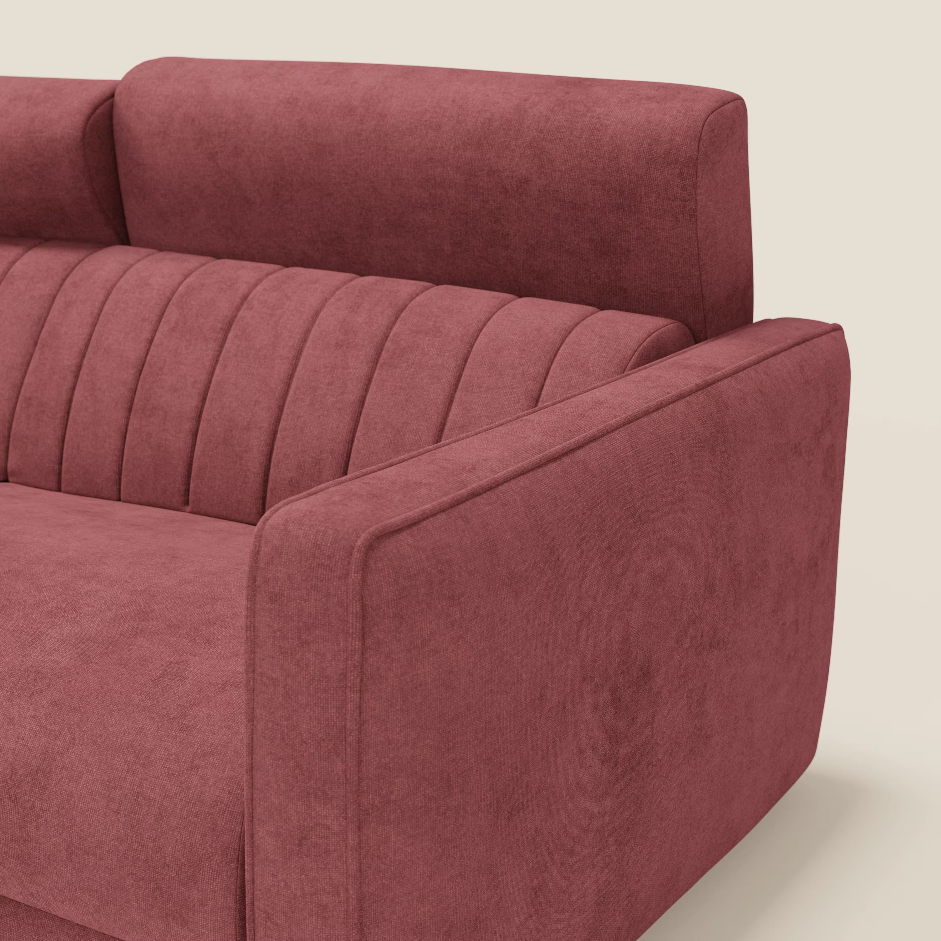 Un primo piano del Nivon Divano letto moderno di Divani.Store mostra il suo design moderno, l'eccezionale comfort del materasso H16 cm, il poggiatesta regolabile e il resistente tessuto impermeabile rosso T25.