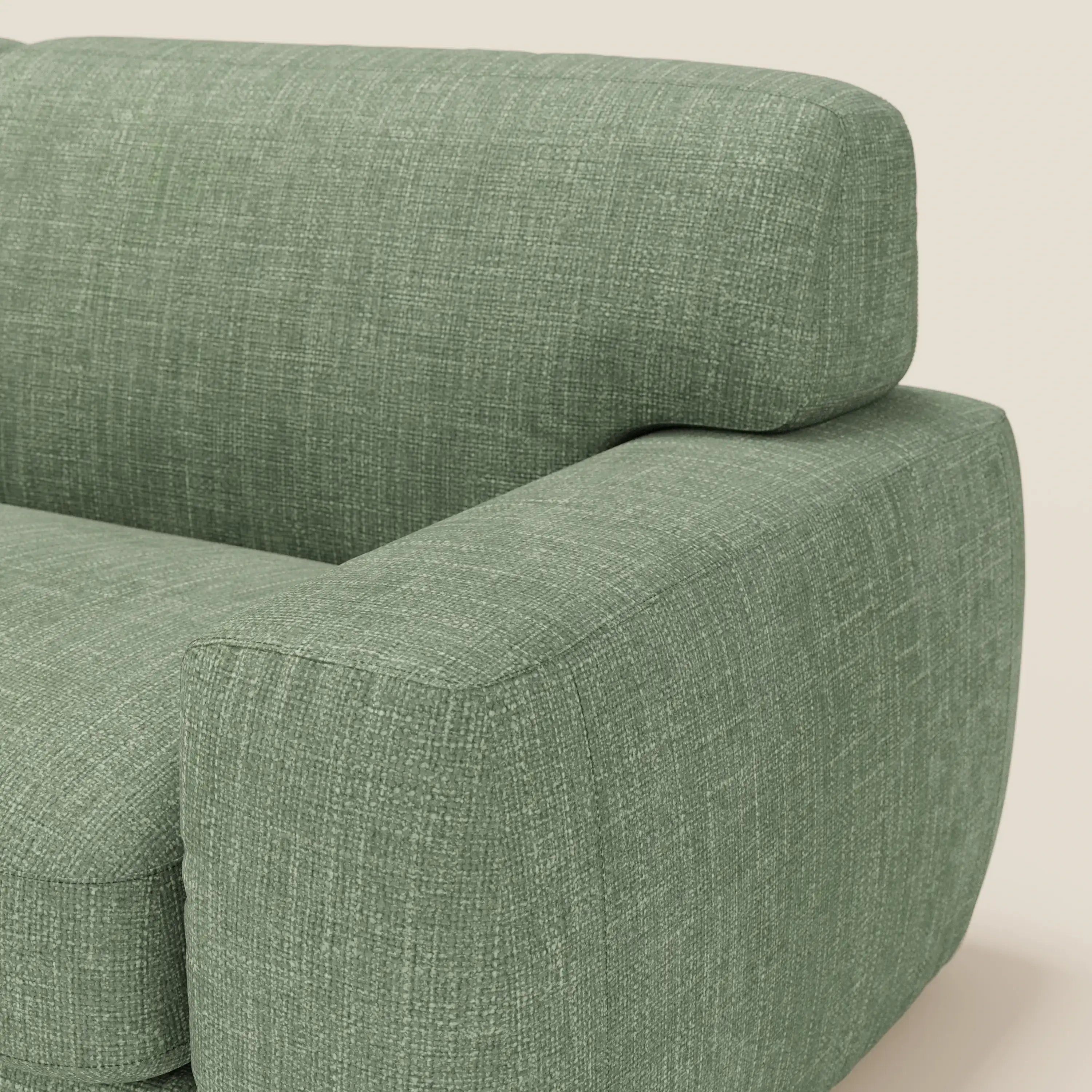 Primo piano del letto materasso Cloud Divano H17 cm di Divani.Store, rivestito in tessuto impermeabile T06 verde salvia con braccioli e schienale rettangolari e spessi, caratterizzato da un sottile motivo a griglia su sfondo beige.