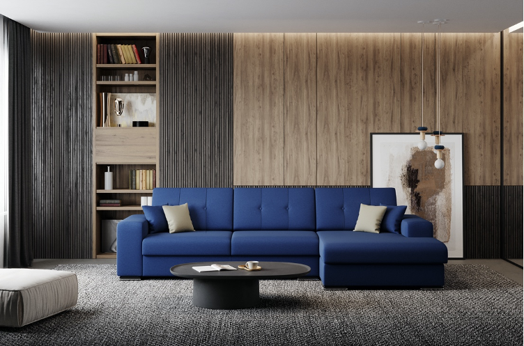 Soggiorno moderno con divano componibile blu, cuscini beige e grigi, tavolino da caffè rotondo nero, libreria incorporata, quadri astratti, pareti rivestite in legno, tende grigie e un pouf grigio su un tappeto testurizzato.