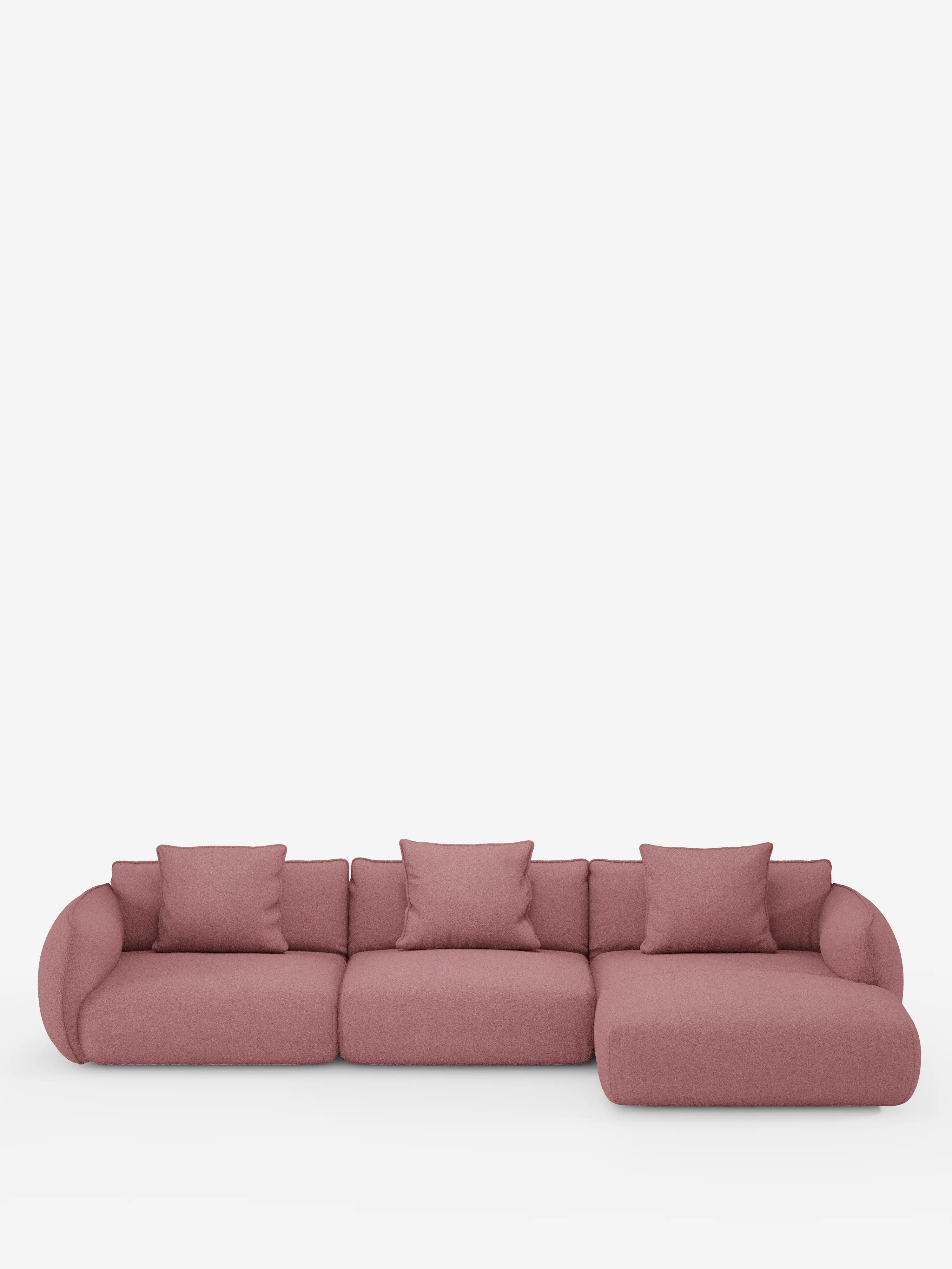 Il divano angolare con penisola componibile Nimbus di Divani.Store è un divano componibile moderno di colore rosa, realizzato in morbido tessuto T33 effetto cotone resistente alle macchie, dotato di quattro cuscini schienali e di una chaise longue a destra, presentato su uno sfondo bianco a tinta unita.