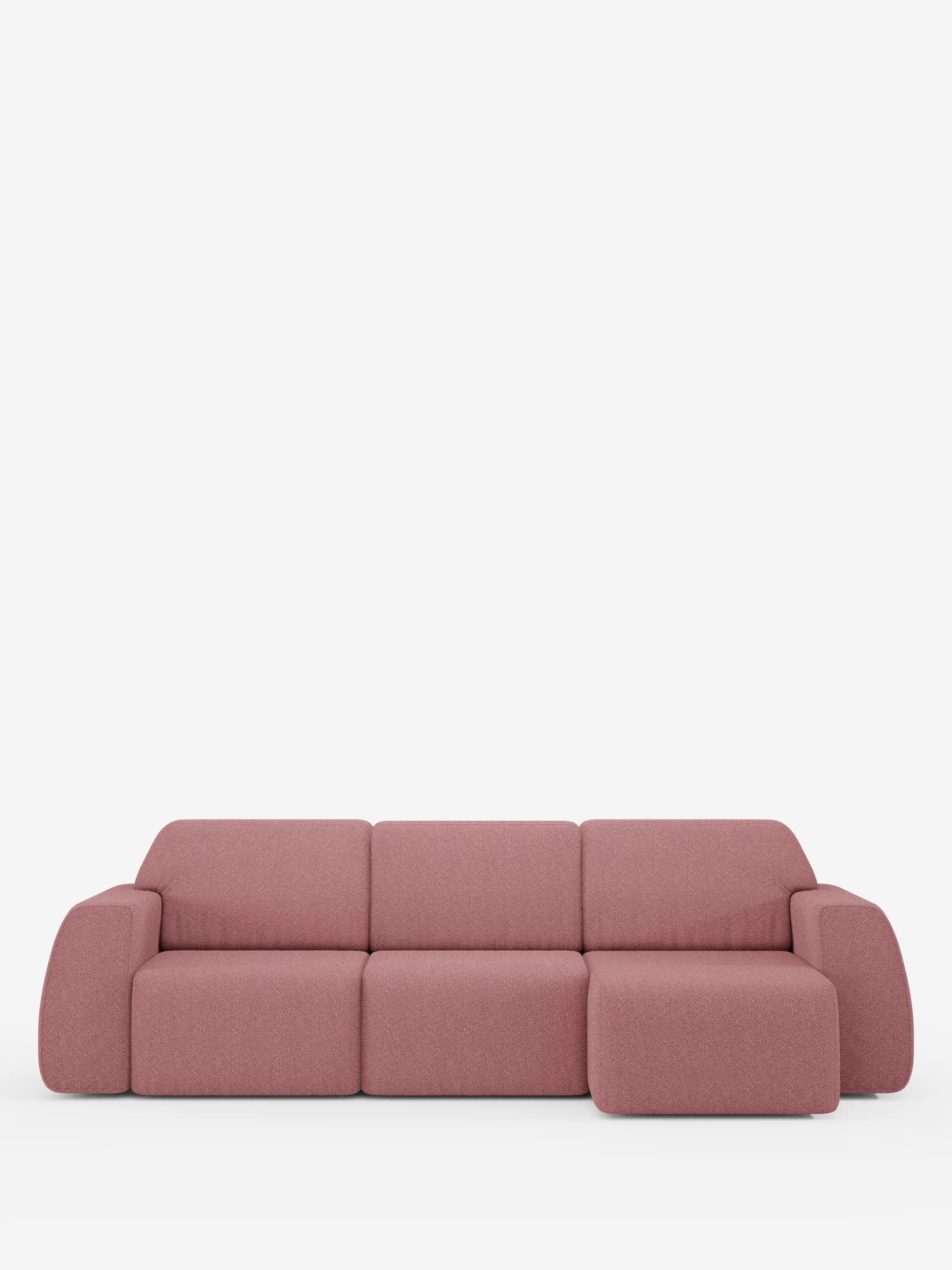 Il divano angolare Orbit con penisola reversibile e tutte le sedute allungabili in tessuto smacchiabile effetto cotone T33 di Divani.Store è un moderno divano componibile a tre posti rivestito in rosa tenue, caratterizzato da morbidi cuscini rettangolari e braccioli arrotondati. Dotato di una chaise longue reversibile sul lato destro, è esposto su uno sfondo bianco a tinta unita.