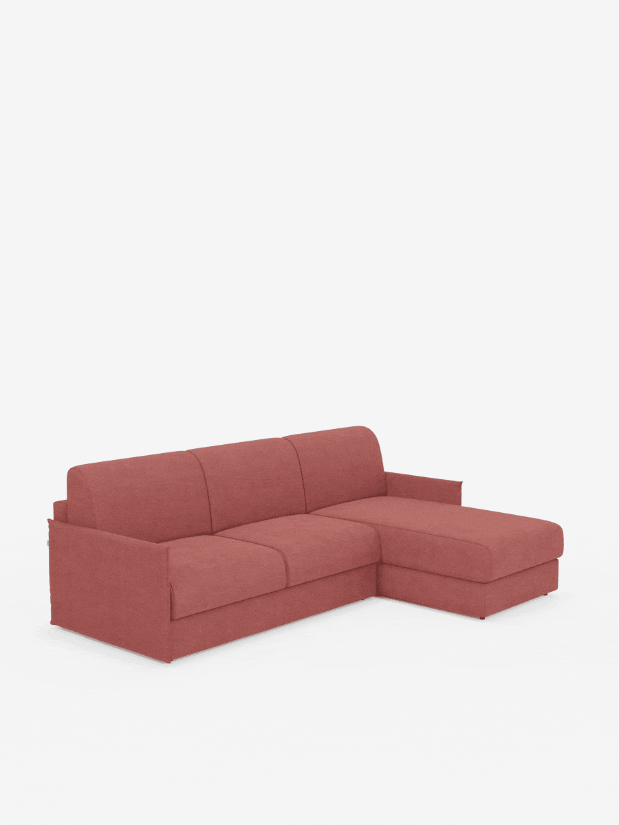 Il divano letto angolare con penisola contenitore Evans di Divani.Store è un divano componibile a tre posti dalle dimensioni compatte, rivestito in rosa antico, caratterizzato da una chaise longue sul lato destro con un pratico vano contenitore (penisola contenitore), linee pulite e dritte, sedute e schienali imbottiti e braccioli dal profilo ribassato. Il divano è raffigurato su uno sfondo bianco a tinta unita.
