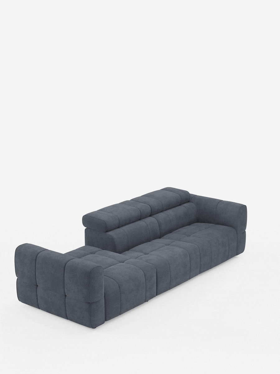 Un divano componibile Giotto grigio antracite con terminale aperto - opzione relax elettrico in tessuto smacchiabile T23, caratterizzato da un design a blocchi con trapuntatura, una sezione sinistra aperta e uno schienale strutturato con poggiatesta integrati.