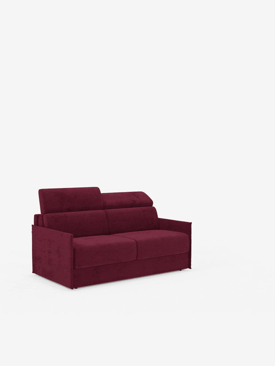 Il divano letto Miryam con poggiatesta reclinabili e comfort maxi di Divani.Store, un divanetto contemporaneo color bordeaux in stile minimal, si caratterizza per le linee pulite, i morbidi cuscini, i poggiatesta regolabili (reclinabili) e i braccioli. Il suo design compatto, realizzato in morbido tessuto T31 resistente alle macchie, è presentato da solo su uno sfondo bianco, senza altri oggetti o elementi decorativi.