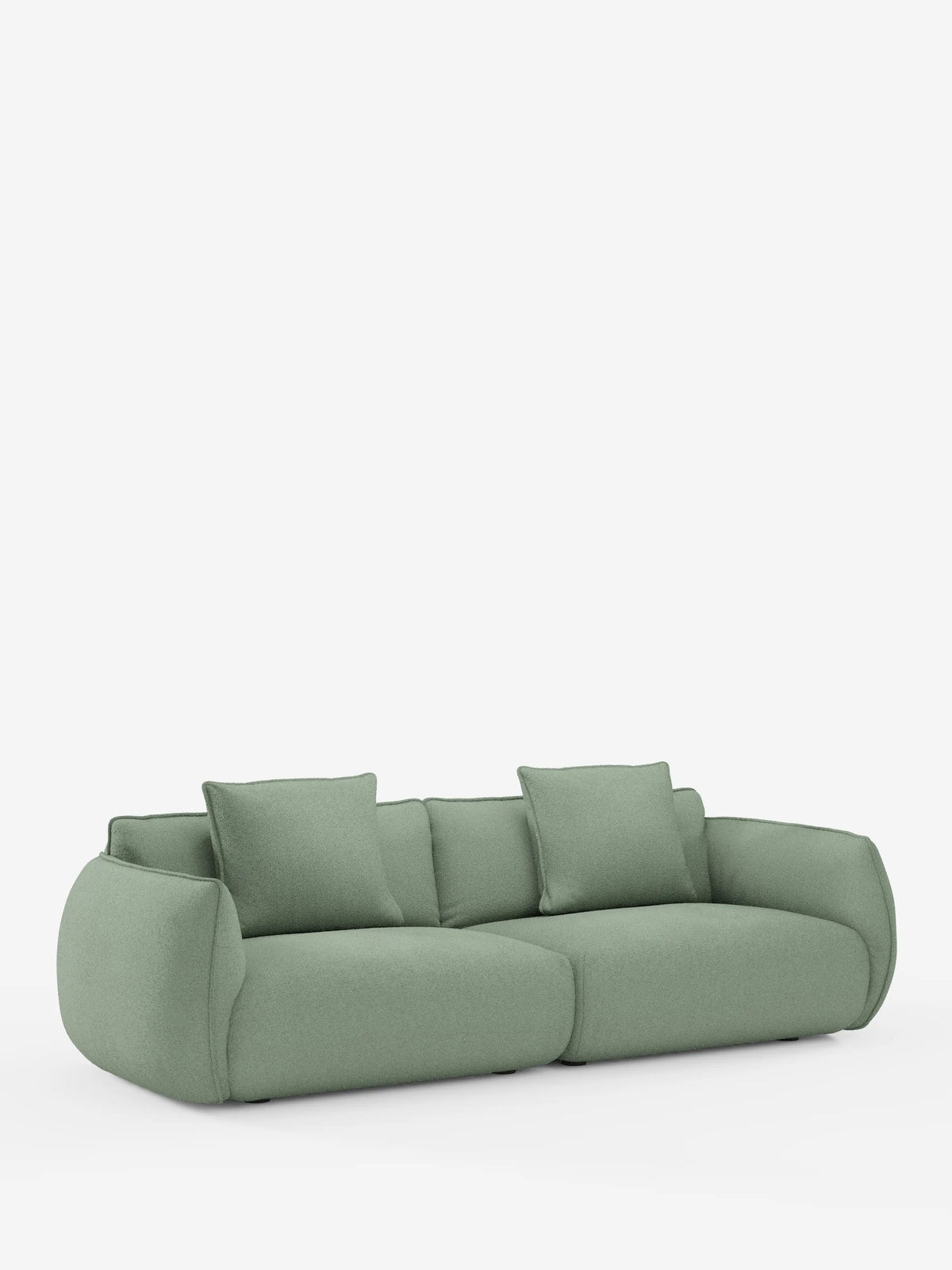 Un “Nimbus divano 3 posti modulare e componibile 250 cm” di Divani.Store, in stile contemporaneo e di colore verde chiaro, rivestito in tessuto t33 effetto cotone, sfoderabile e antimacchia. Il divano è dotato di due cuscini di seduta, tre cuscini dello schienale e due braccioli laterali, con una silhouette bassa e ampia e bordi arrotondati e morbidi. Sullo sfondo bianco a tinta unita, risalta il design morbido e moderno del divano.