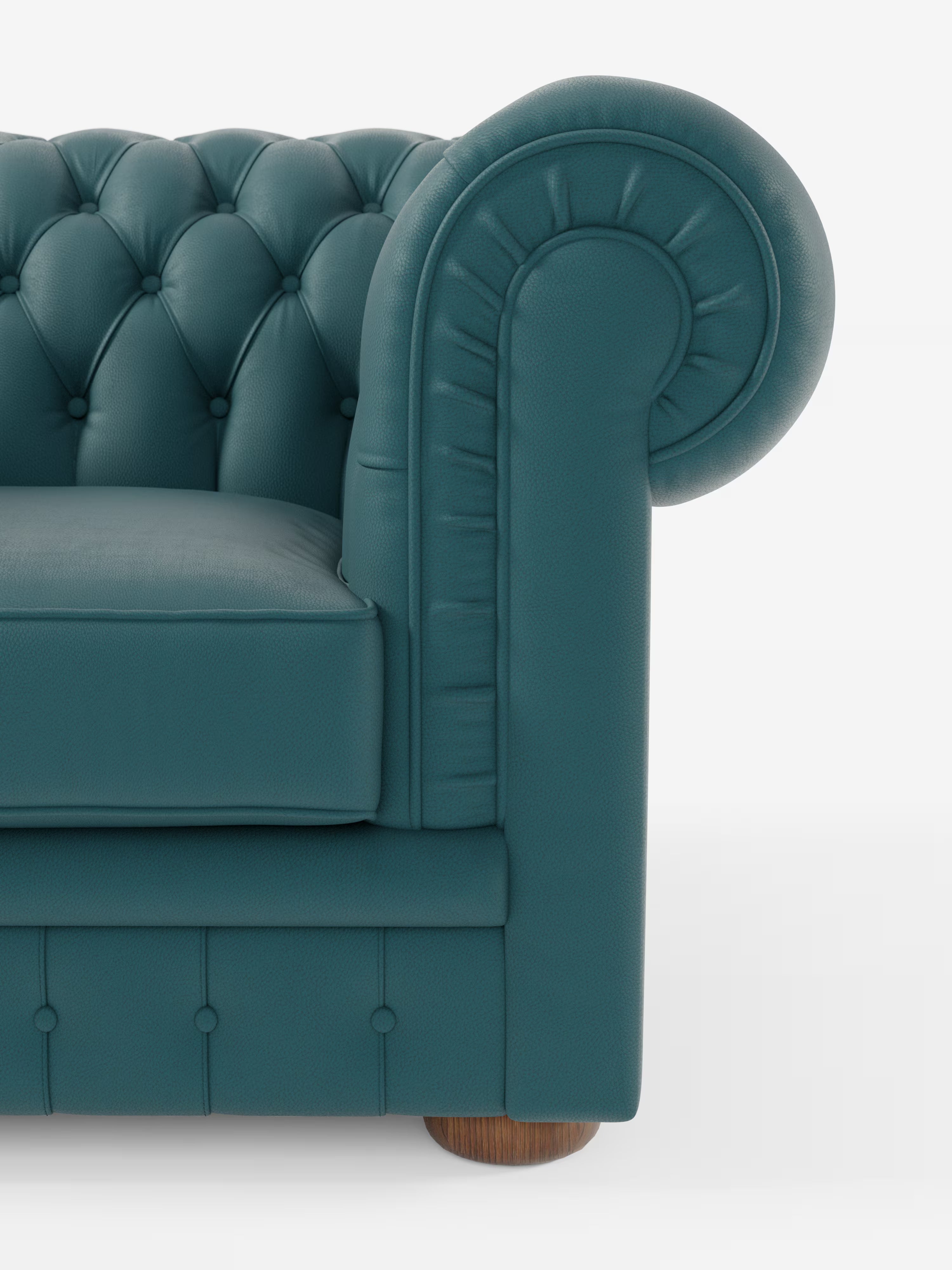 Primo piano di una poltrona Chester color verde acqua in vera pelle spessorata con capitonné artigianale di Divani.Store, che mette in risalto il design arrotondato dei braccioli, lo schienale profondamente trapuntato, la seduta imbottita e la gamba rotonda in legno. Su uno sfondo bianco a tinta unita, questo lussuoso complemento d’arredo mette in risalto l’eleganza e la raffinatezza che la poltrona in pelle di Divani.Store conferisce a qualsiasi ambiente.
