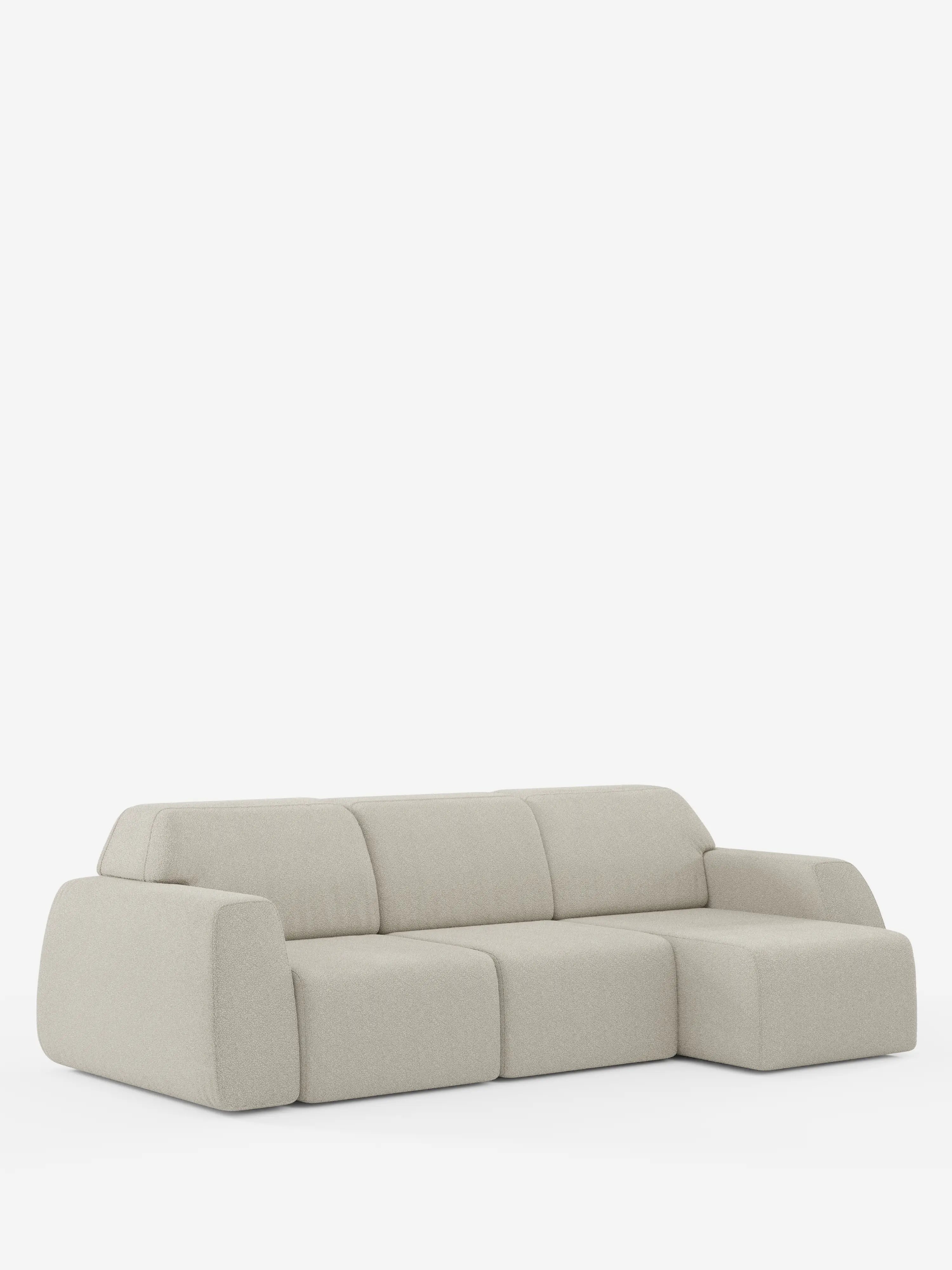 Vi presentiamo il divano angolare Orbit con penisola reversibile e tutte le sedute allungabili di Divani.Store: un divano modulare dalle linee eleganti, in grigio chiaro, dotato di tre posti e di una chaise longue reversibile sul lato destro. Rivestito in tessuto T33 effetto cotone resistente alle macchie, il suo design è caratterizzato da bordi morbidi e arrotondati e da uno schienale basso. Esposto su uno sfondo bianco a tinta unita, l’estetica contemporanea e minimalista del divano è in primo piano.
